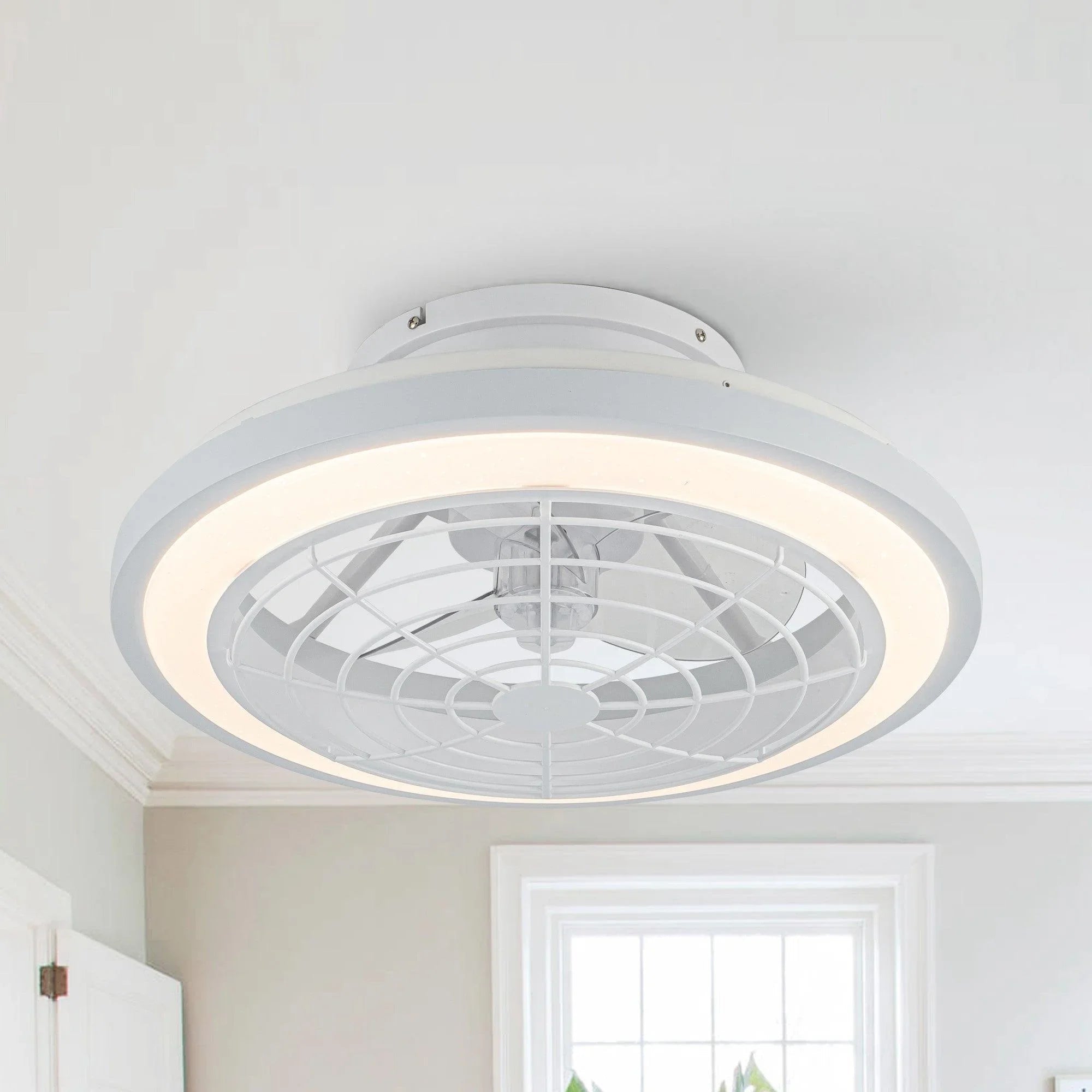 White flush-mount ceiling fan with integrated light on ceiling
