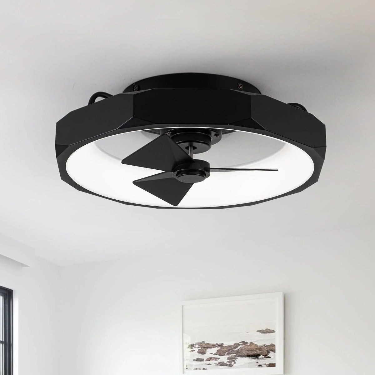 Black flush mount ceiling fan with integrated light panel and three blades