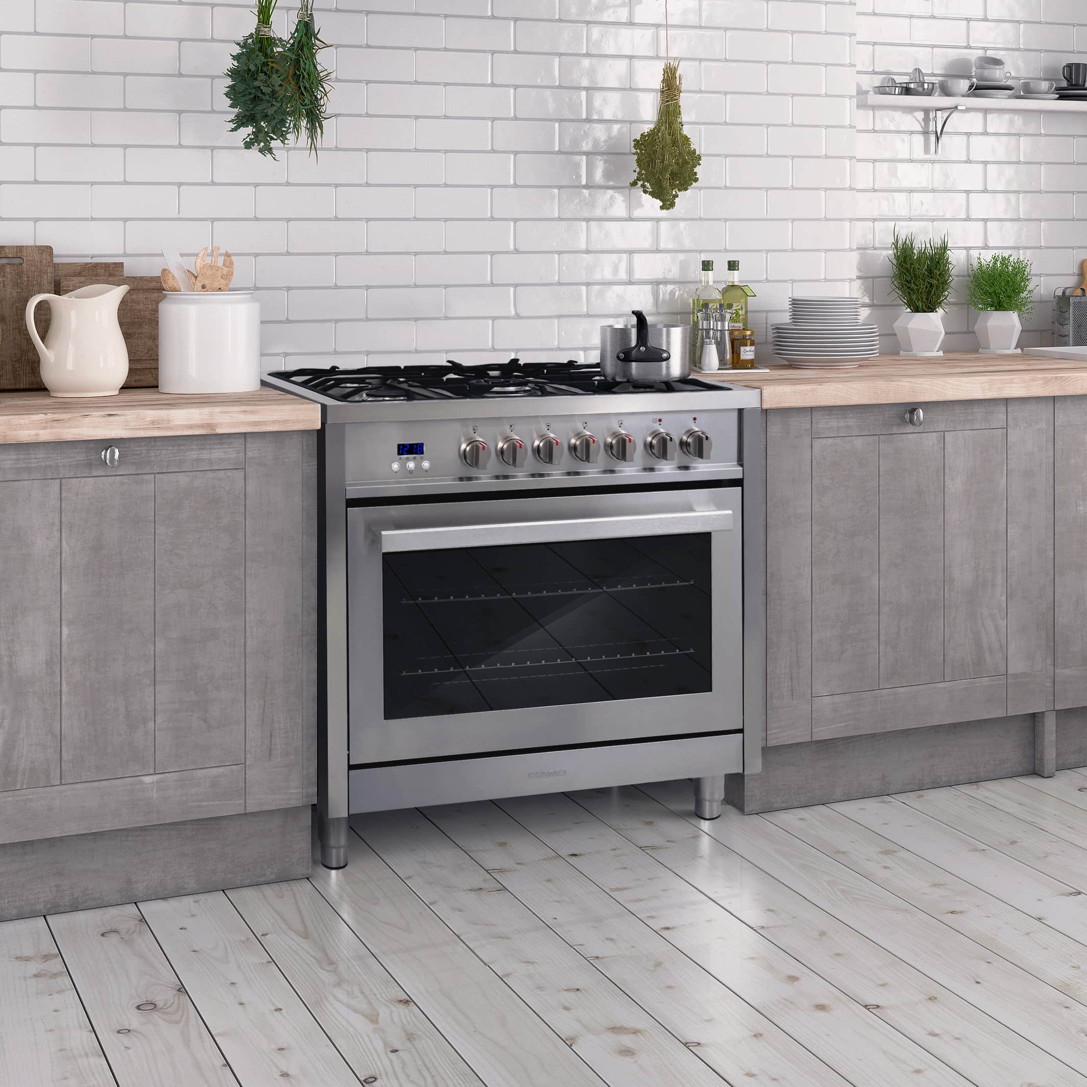 Stainless steel dual fuel range with front oven door and control knobs