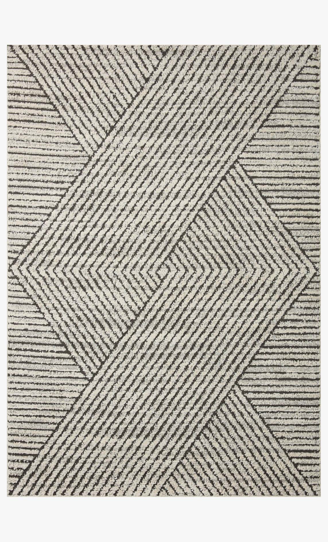 Ivory and charcoal transitional rug with central diamond geometric pattern and stripes.