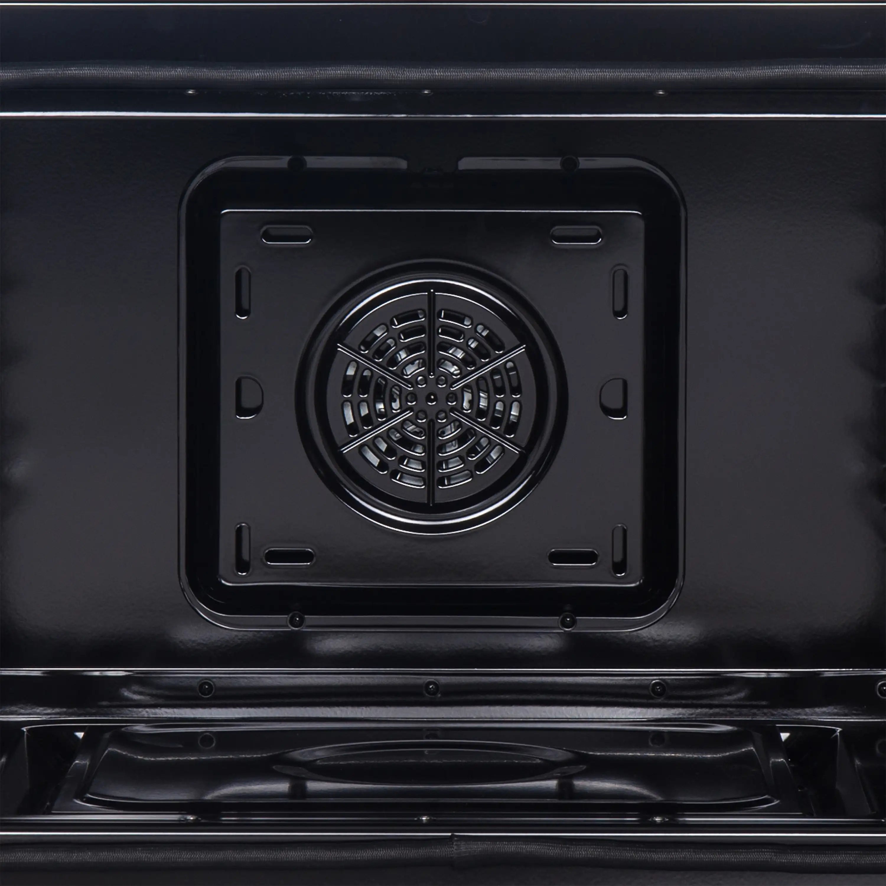 Electric wall oven fan and vent circular plate on oven back wall