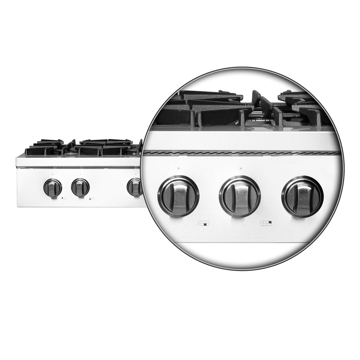 Stainless steel gas cooktop control panel close-up with round burner knobs