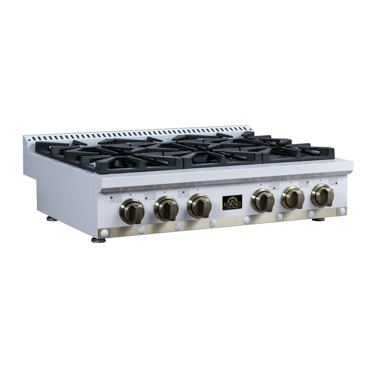 White gas cooktop with black grates and 6 burner layout, brass knobs, angled view