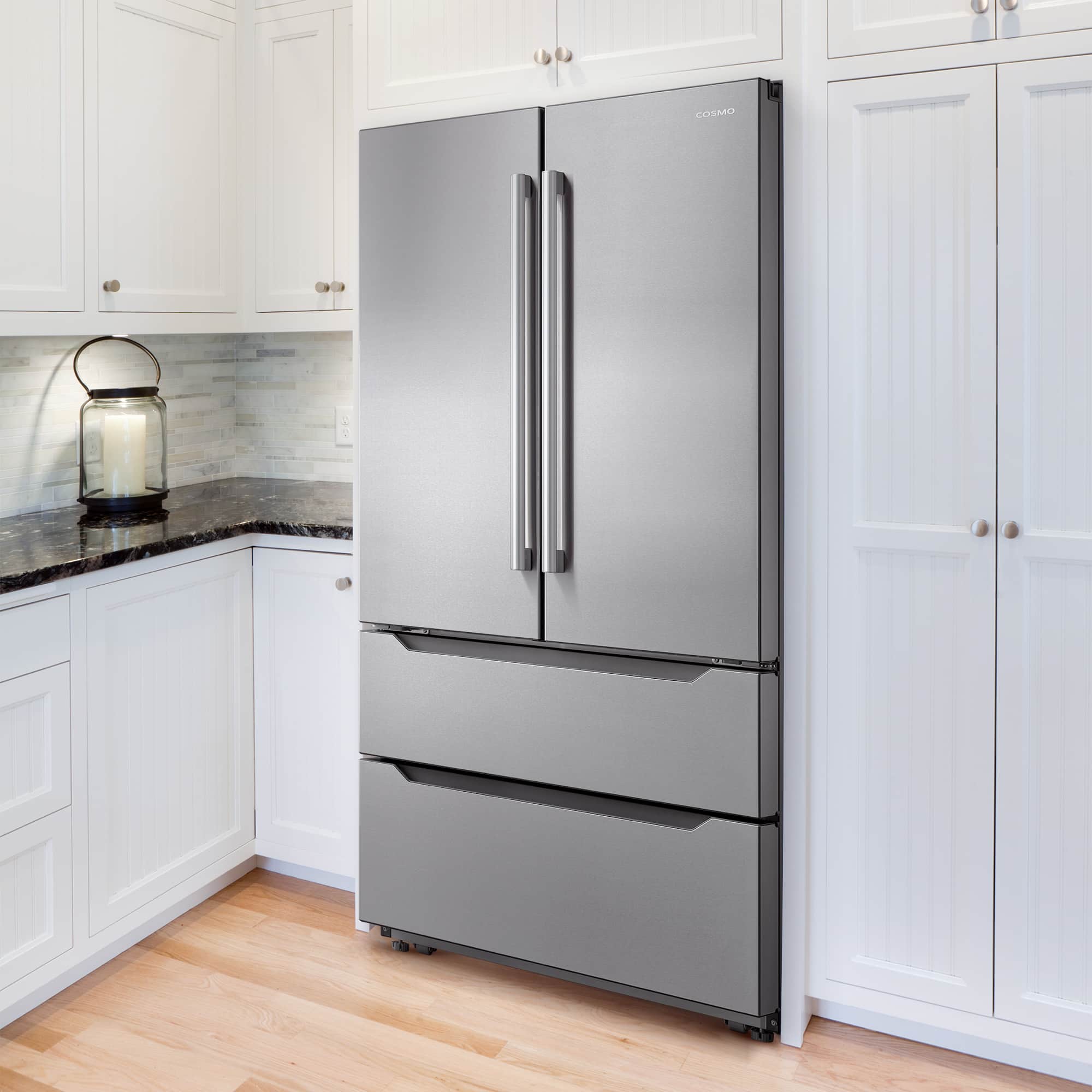 Stainless steel top-freezer refrigerator with two vertical handles and bottom crisper drawers
