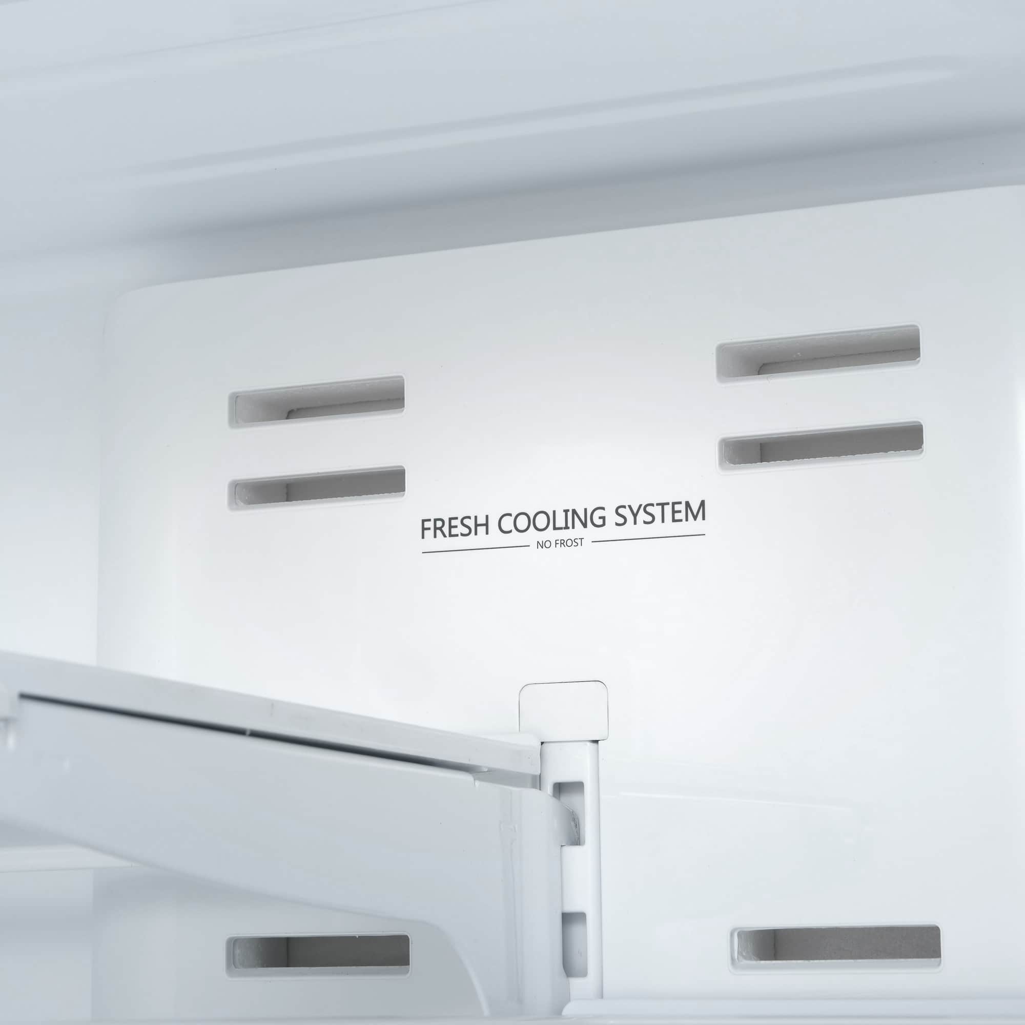 Freezer interior panel with FRESH COOLING SYSTEM label
