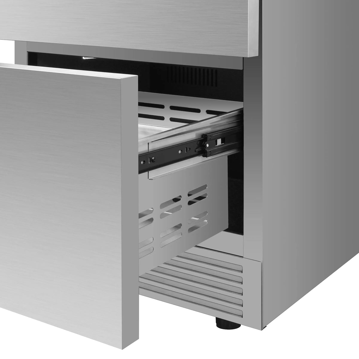Stainless steel drawer freezer unit with one drawer open and interior racks visible