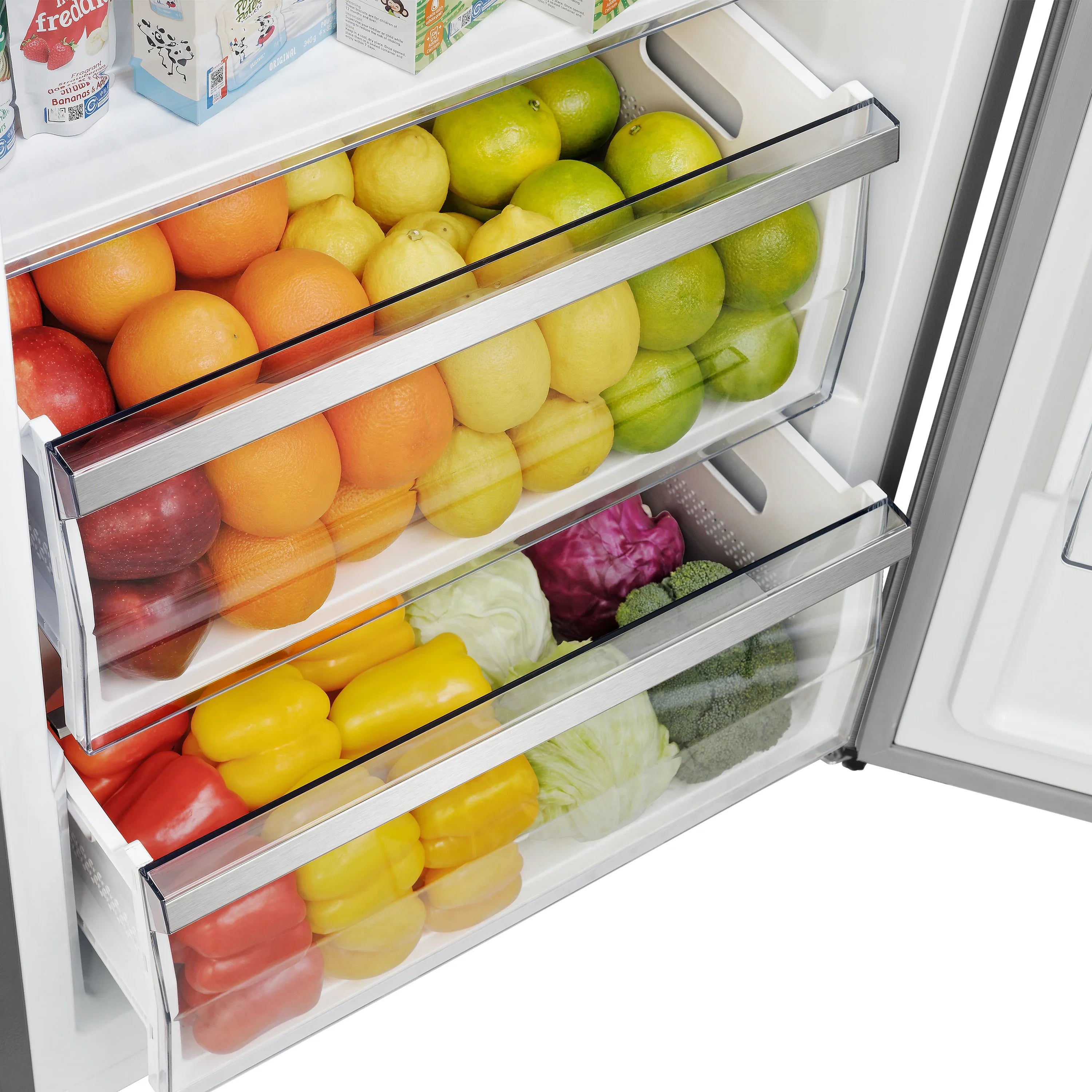 Frost-free refrigerator interior with three glass shelves and colorful produce