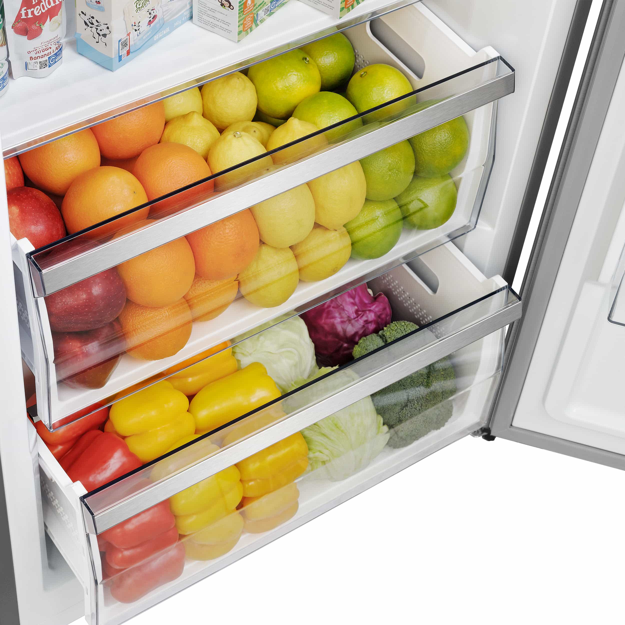 Refrigerator crisper drawers filled with colorful fruits and vegetables