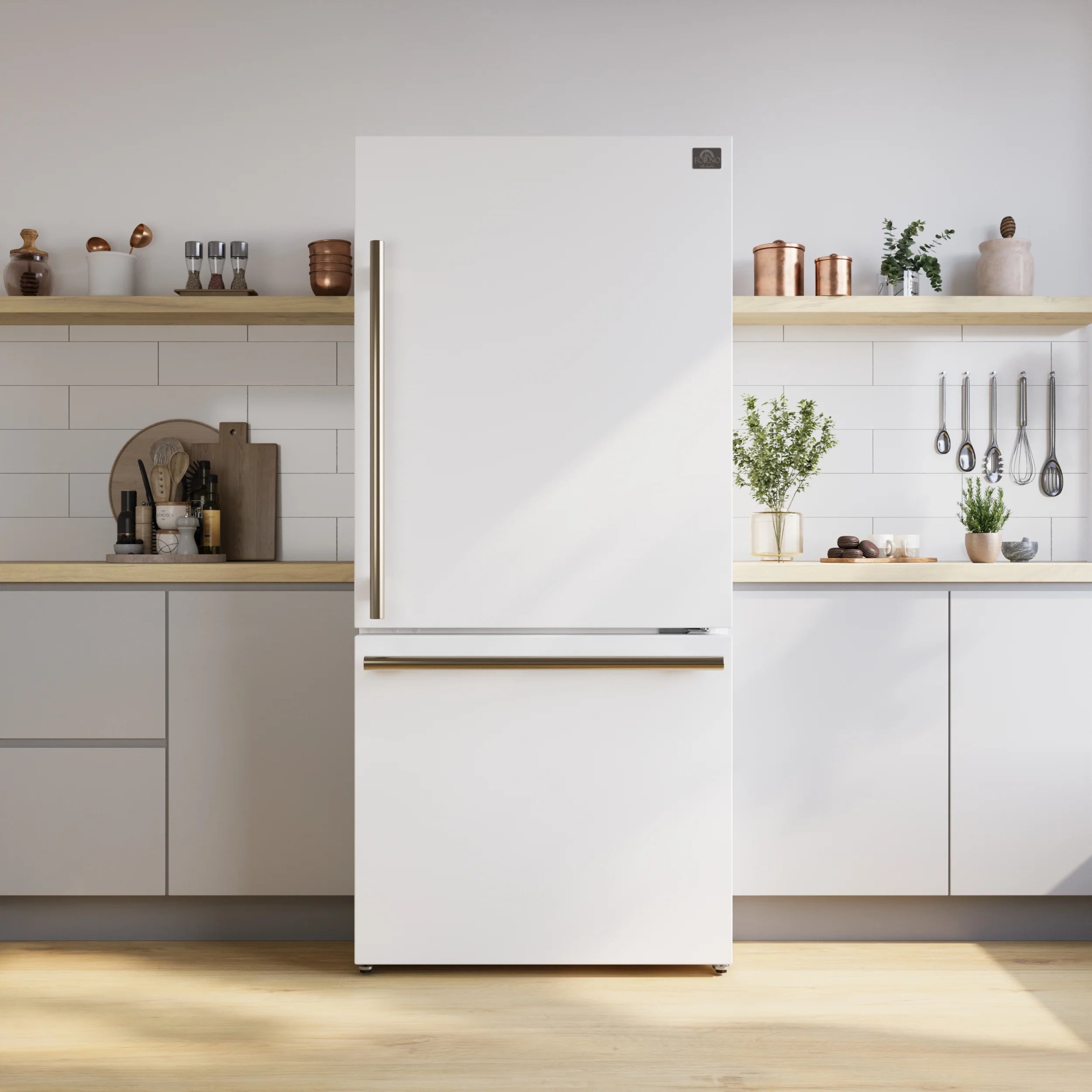 White refrigerator with brass handle standing in a kitchen setting, doors closed.