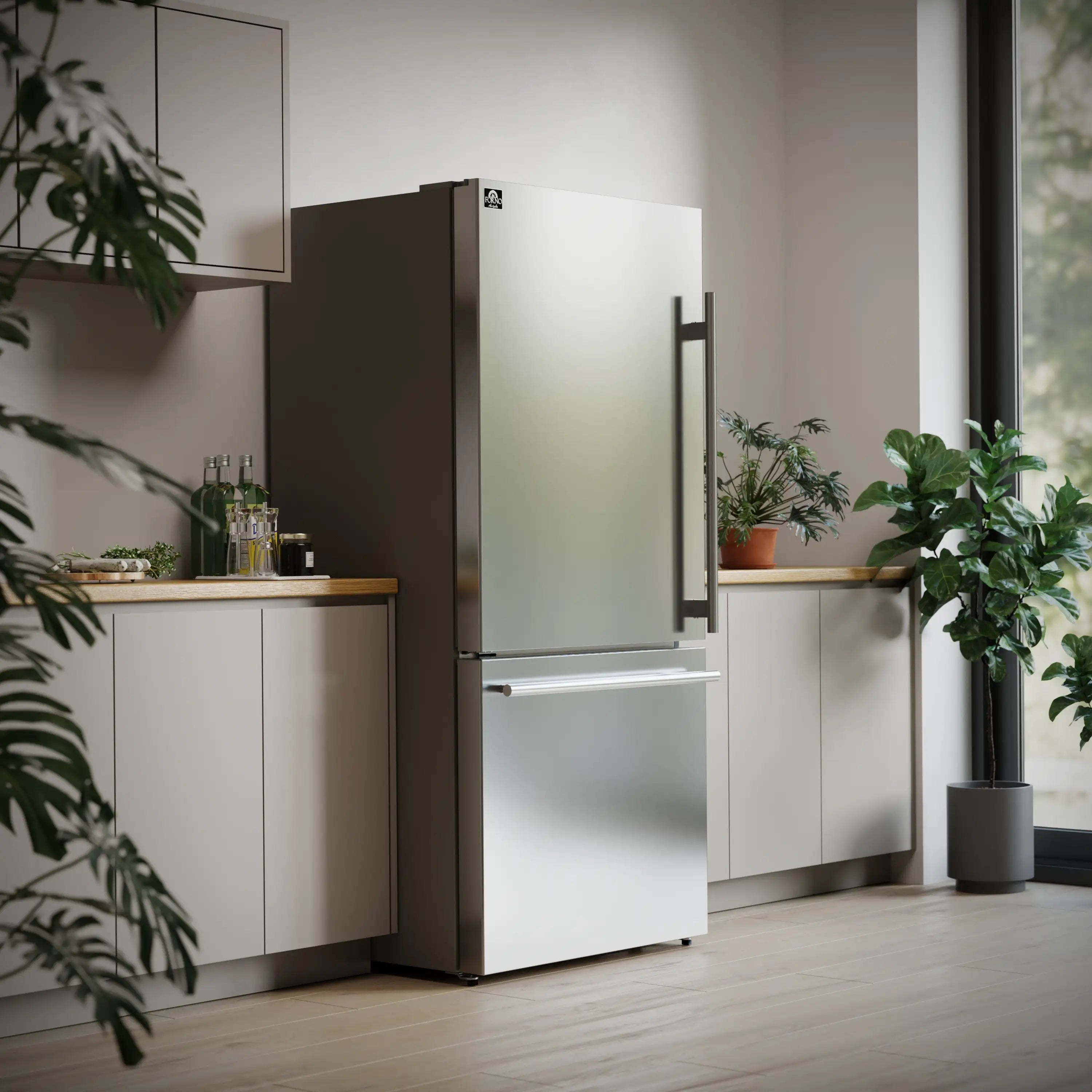 Stainless steel refrigerator with bottom freezer, doors closed in modern kitchen.