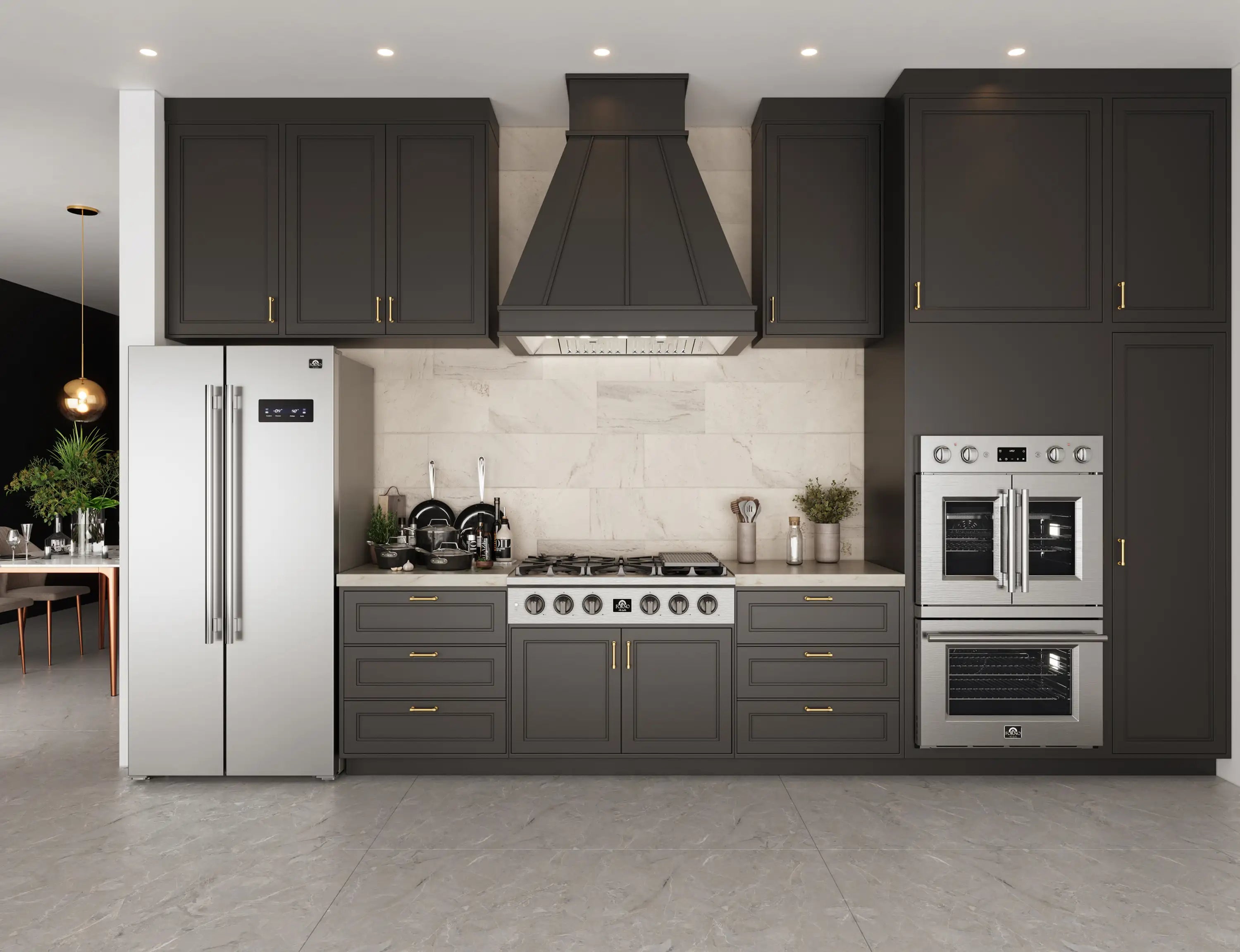 Stainless steel insert range hood installed above a kitchen cooktop
