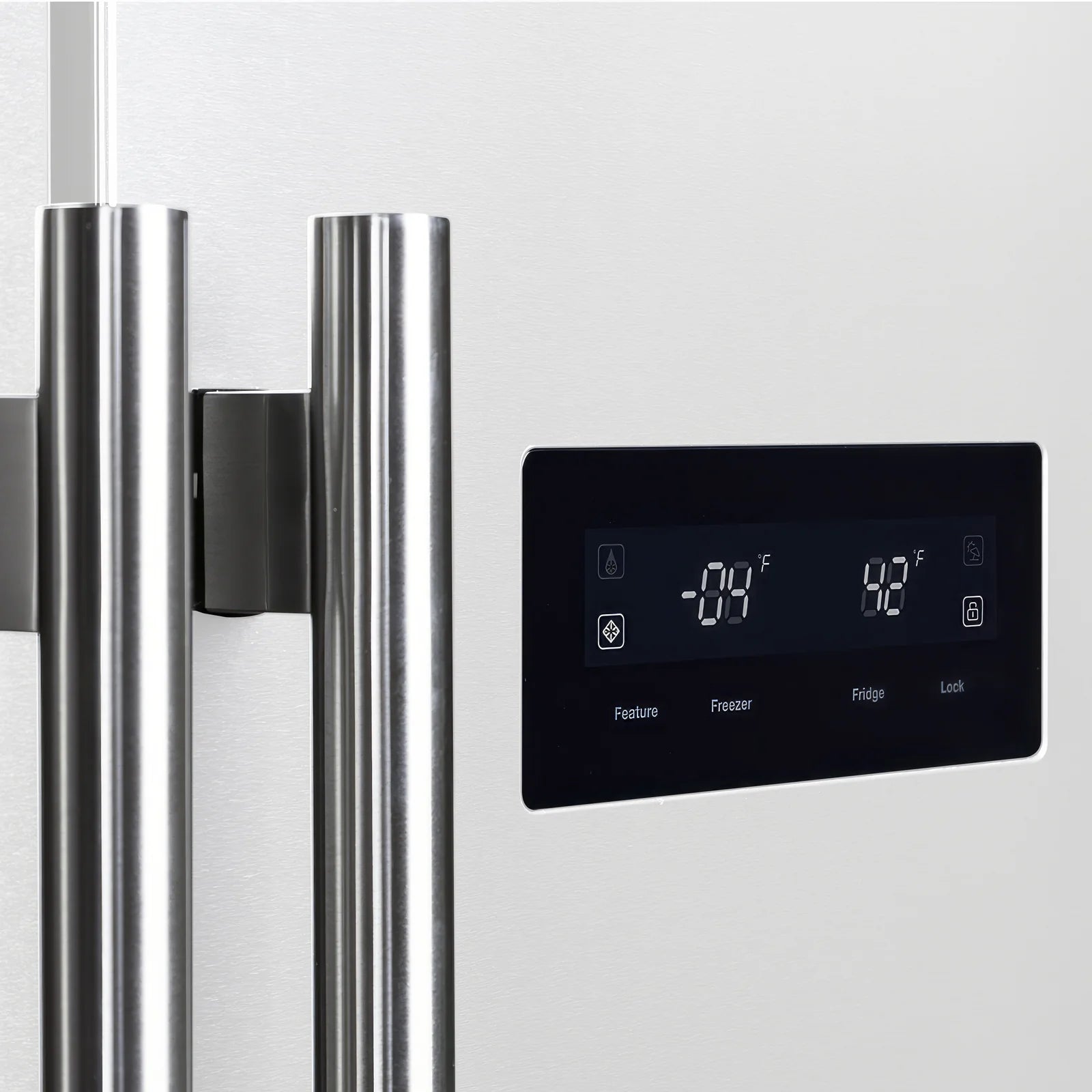 White refrigerator door with stainless handles and black digital control panel display
