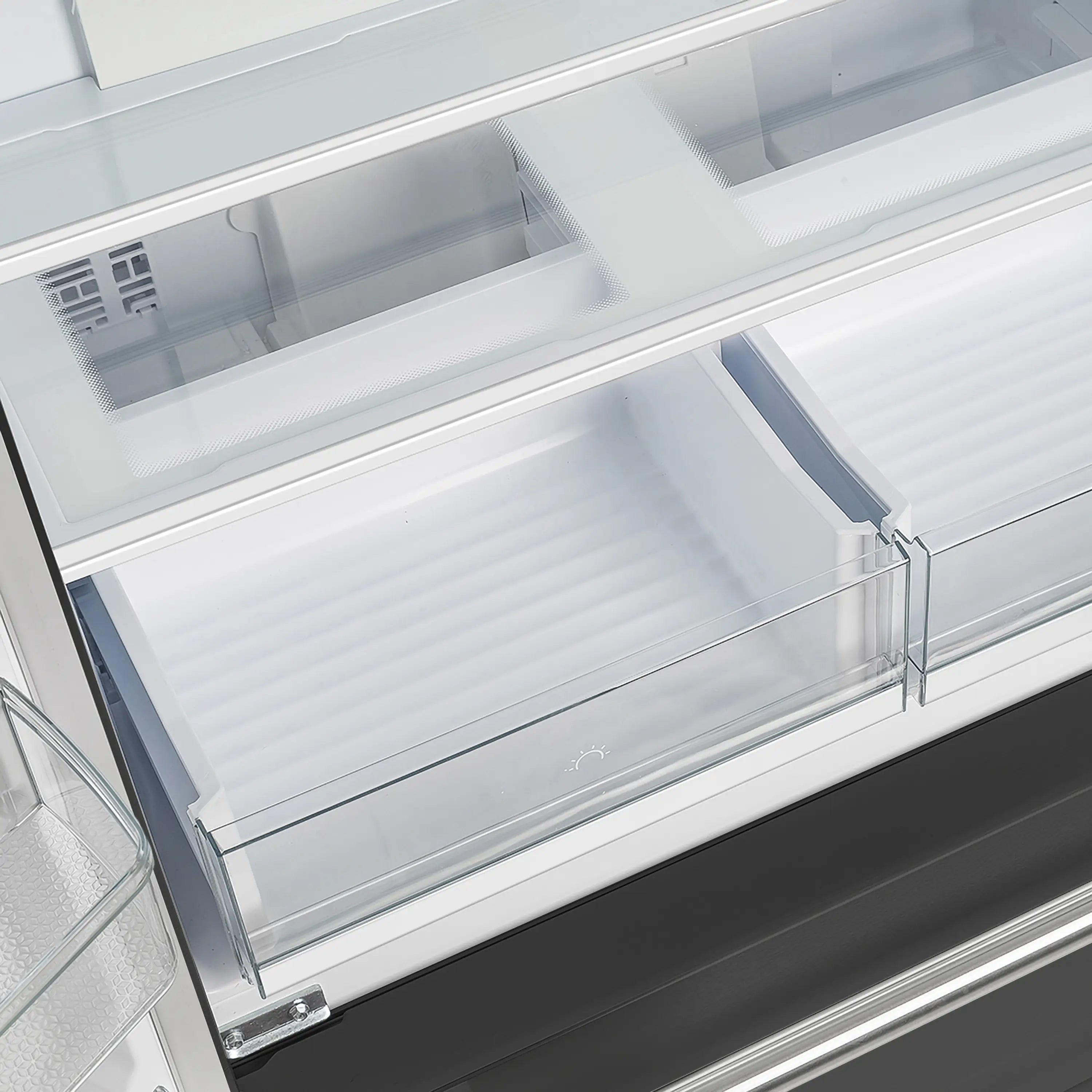 Refrigerator freezer drawer with clear front panel and pull-out storage rails