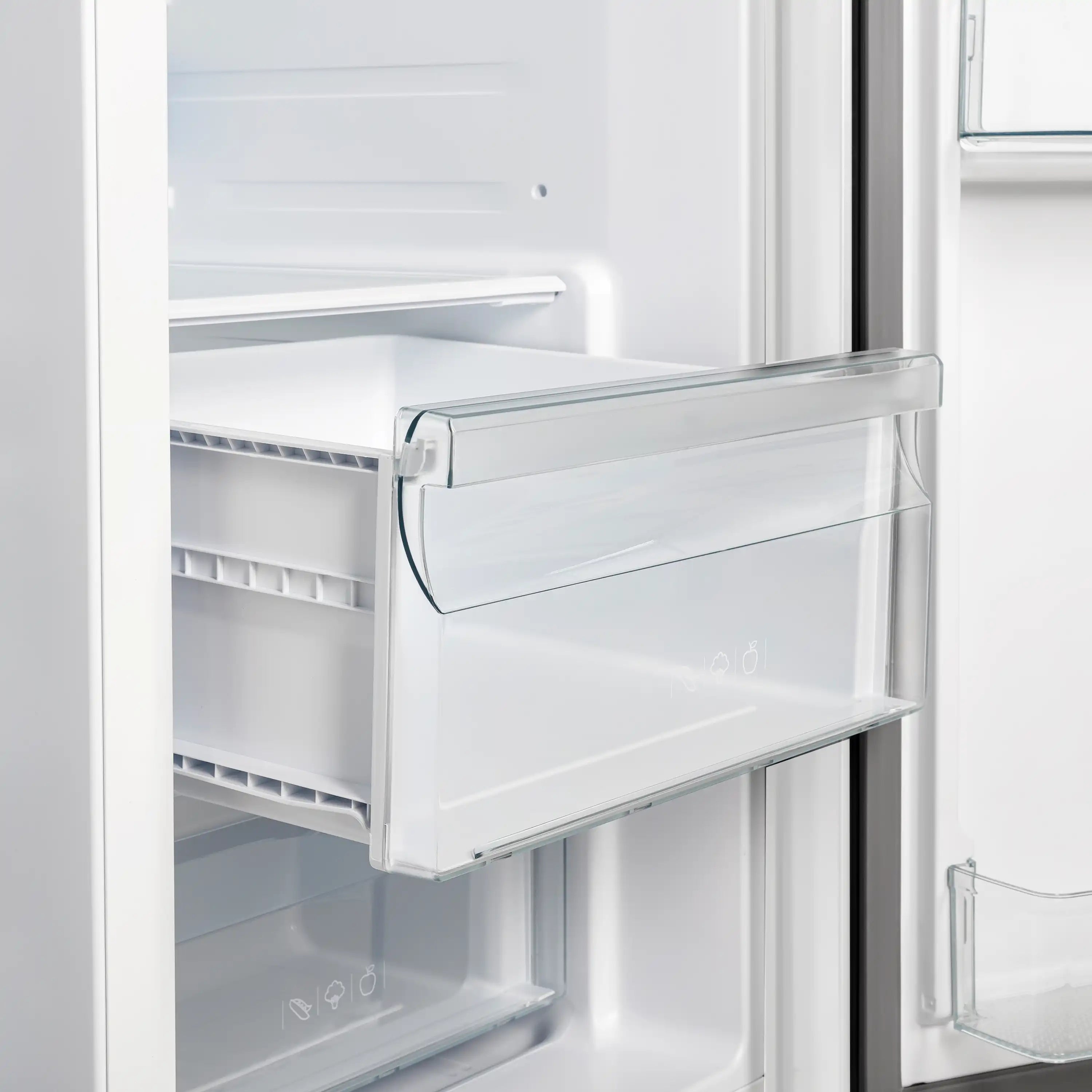 Refrigerator door interior with clear storage bin and white shelf liner