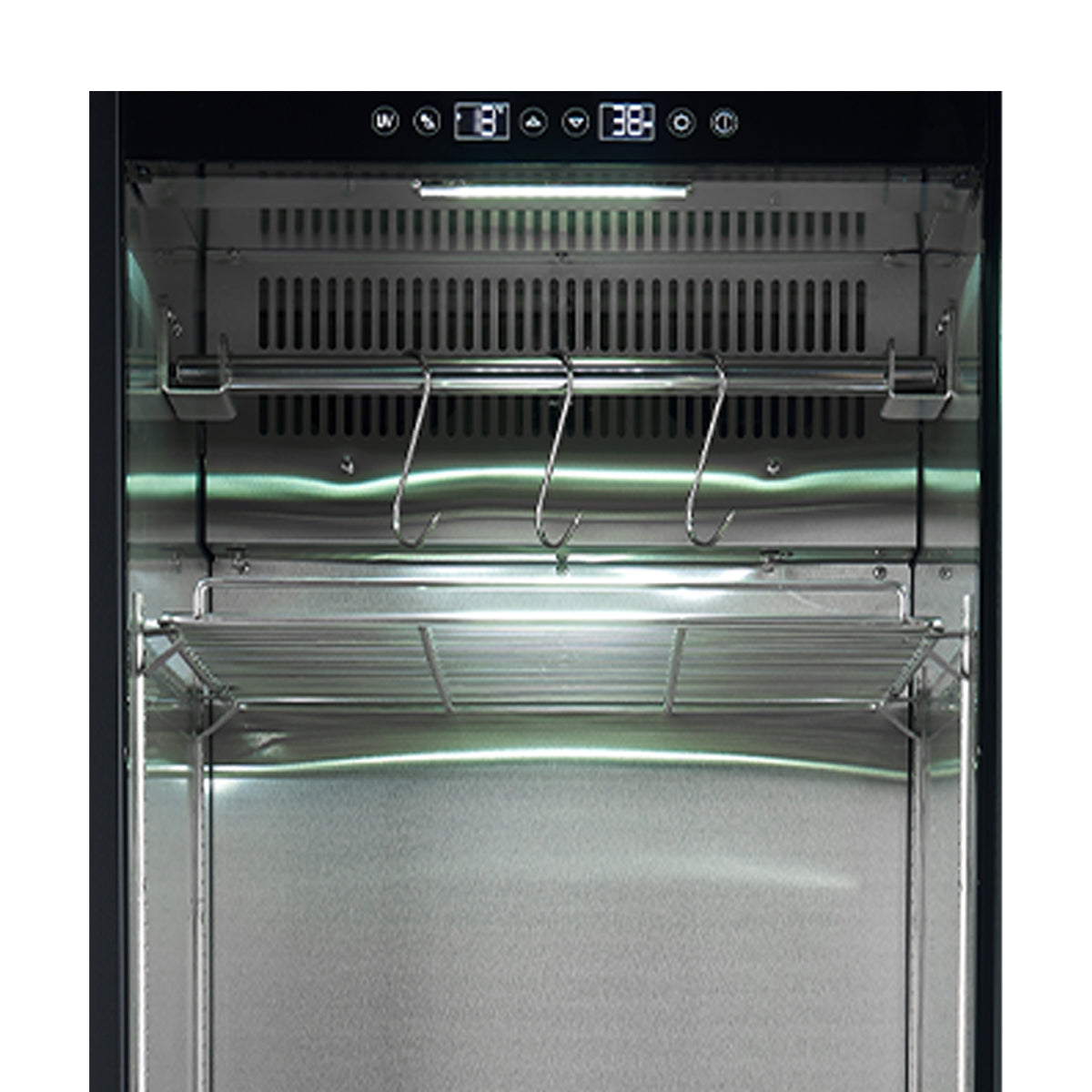 Dry aging cabinet interior with metal racks, ducts, and top control strip