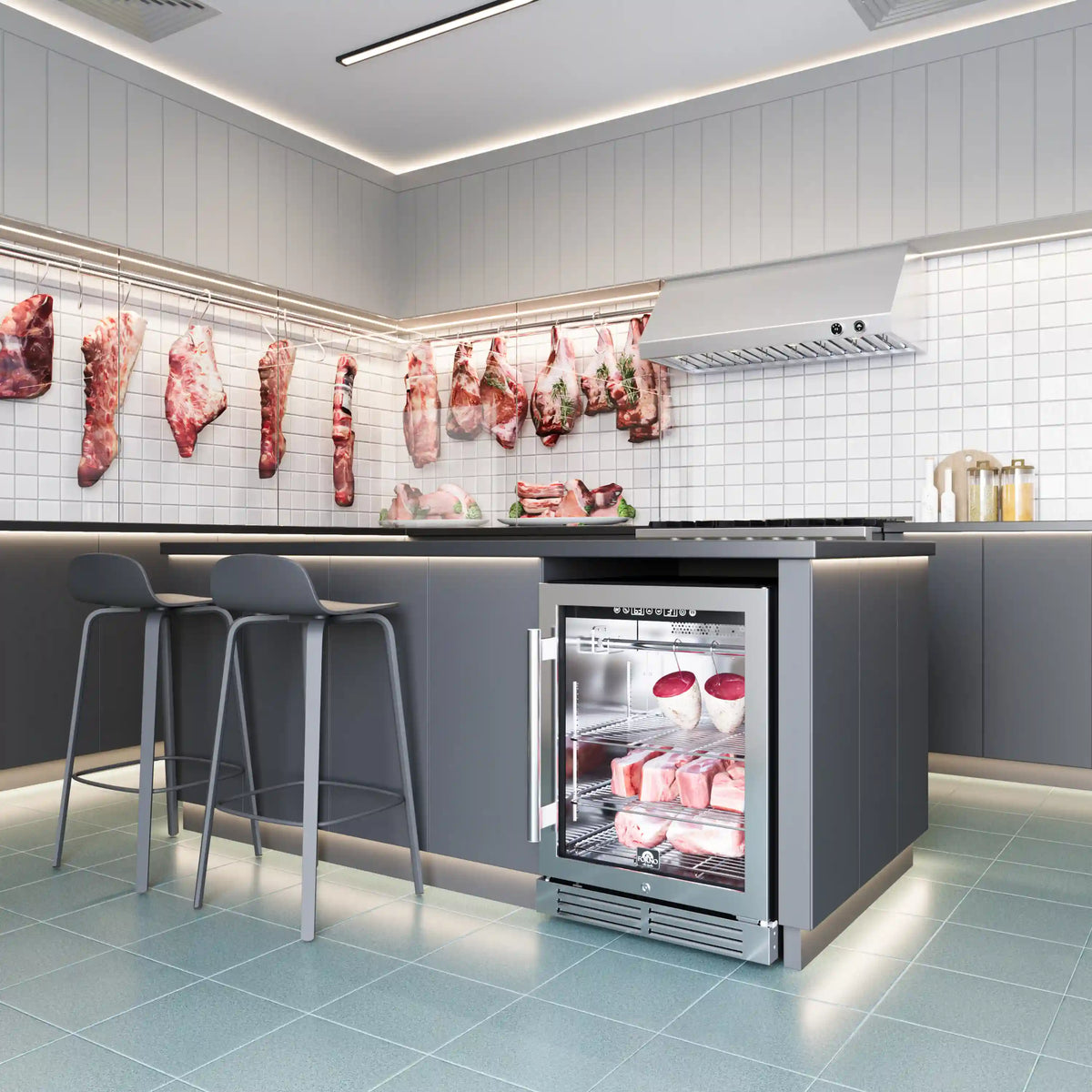 Stainless steel dry aging cabinet in kitchen, glass door showing hanging meats inside
