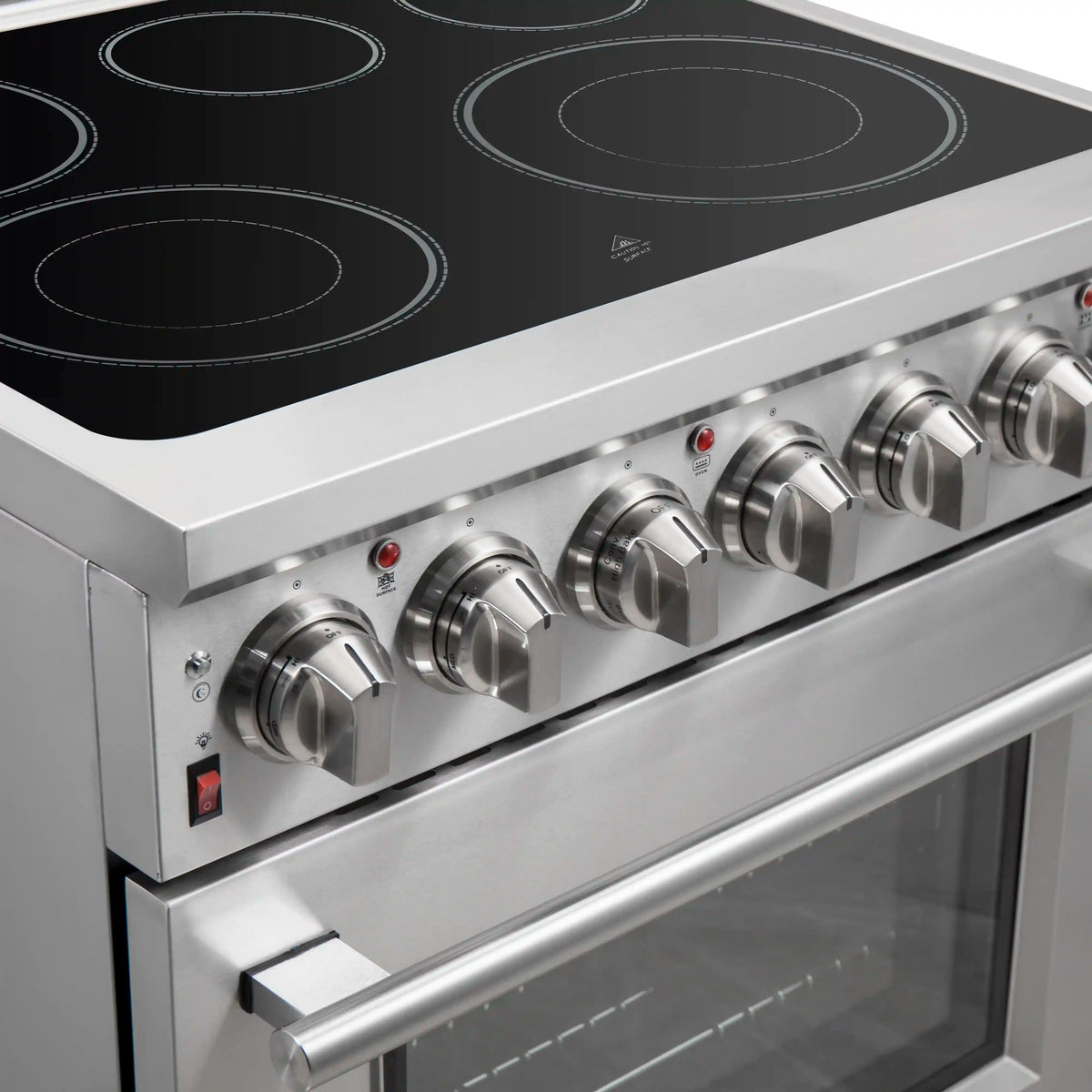 Stainless steel electric range control knobs and smooth black cooktop with four heating zones