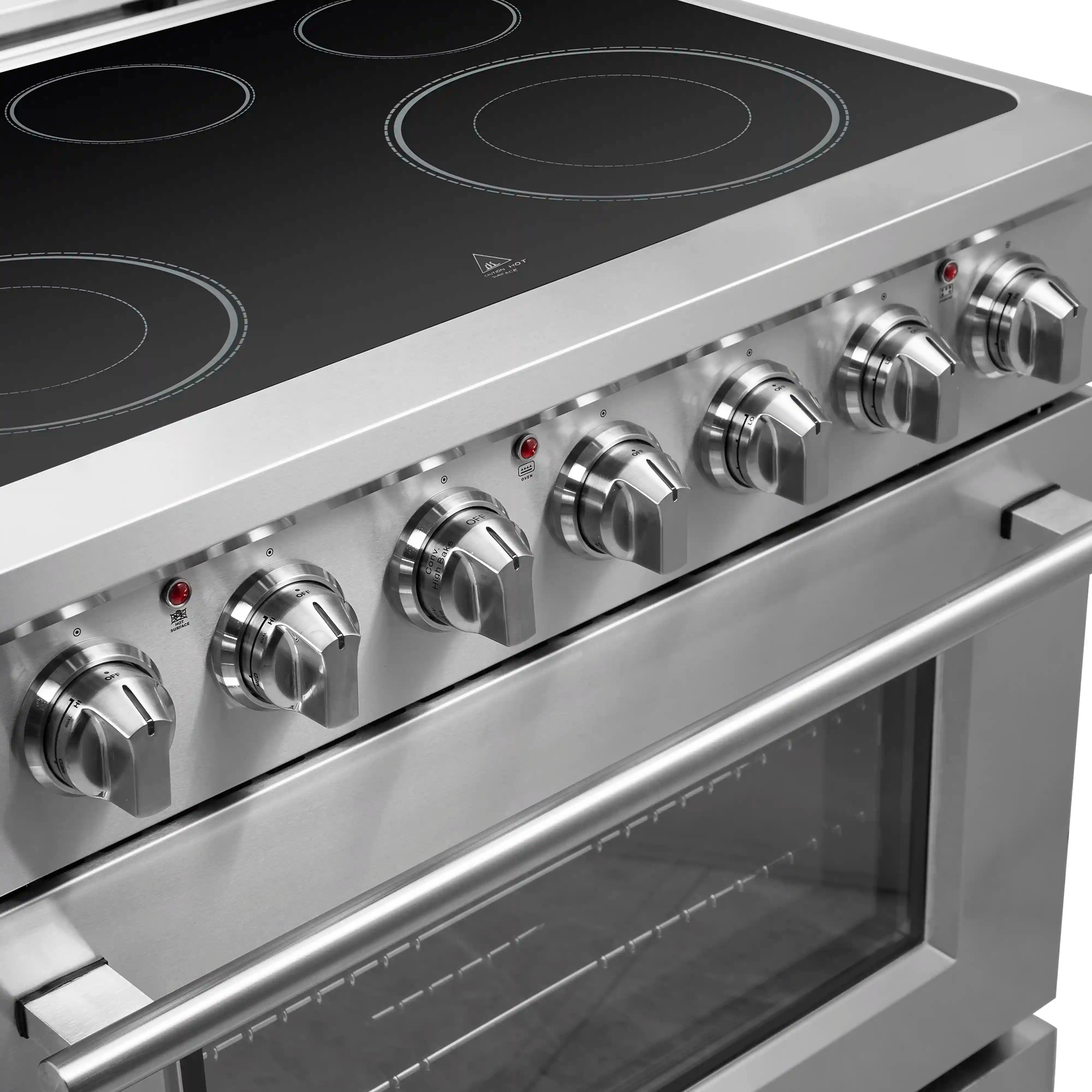 Electric range control knobs and black cooktop with oven door window edge detail