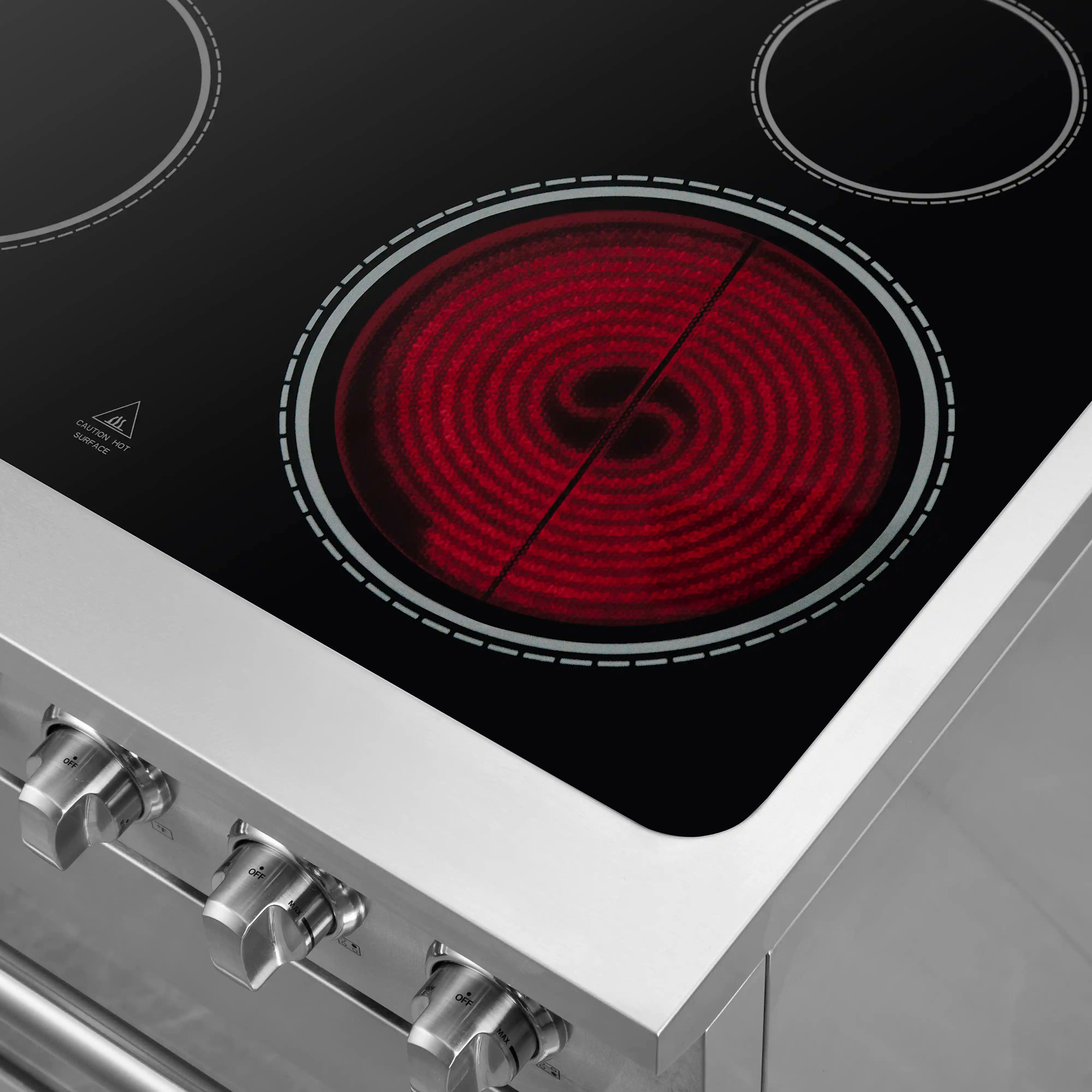 Forno electric range cooktop close-up with a red coil burner and control ring