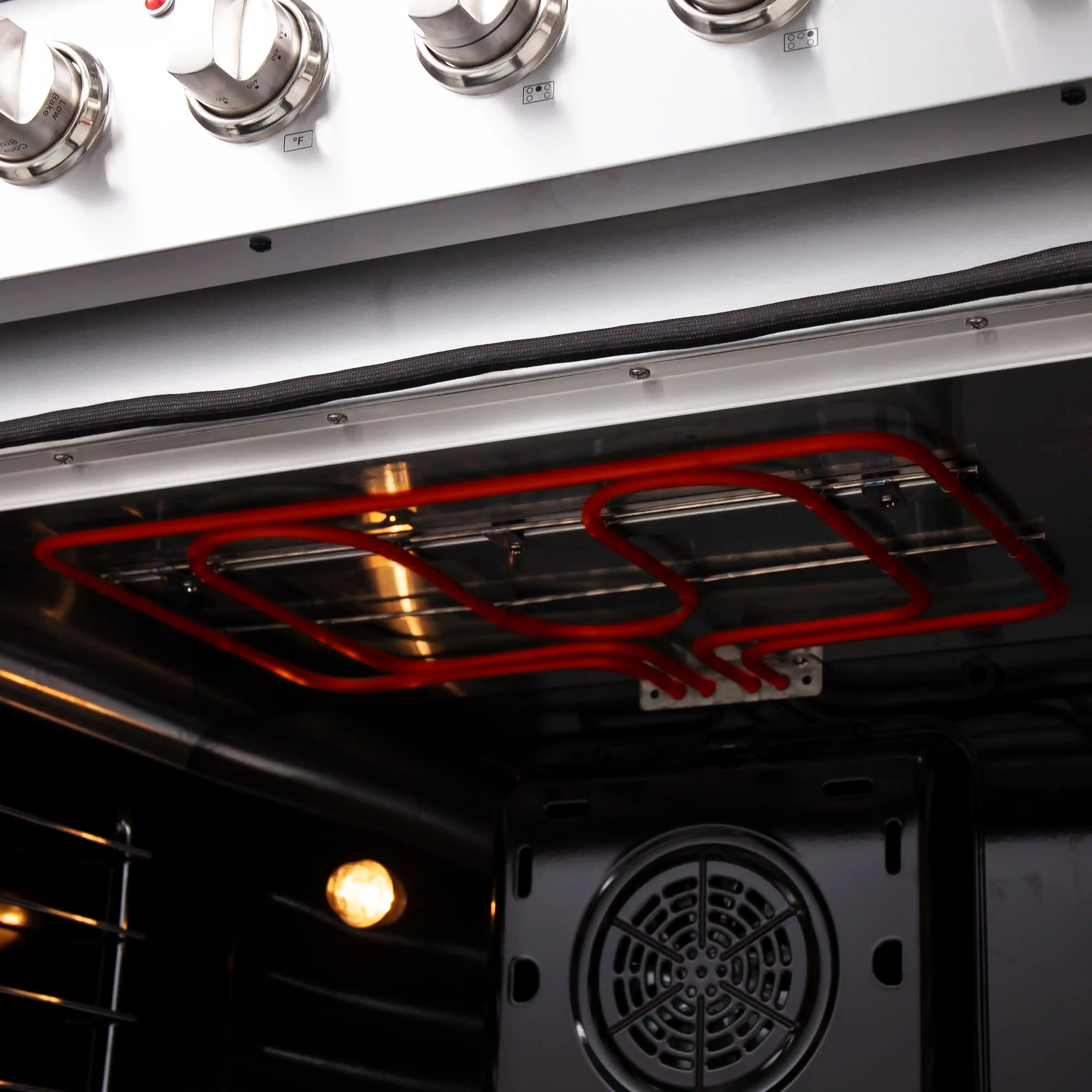 Pro-style electric range oven interior with red heating elements and round fan grille