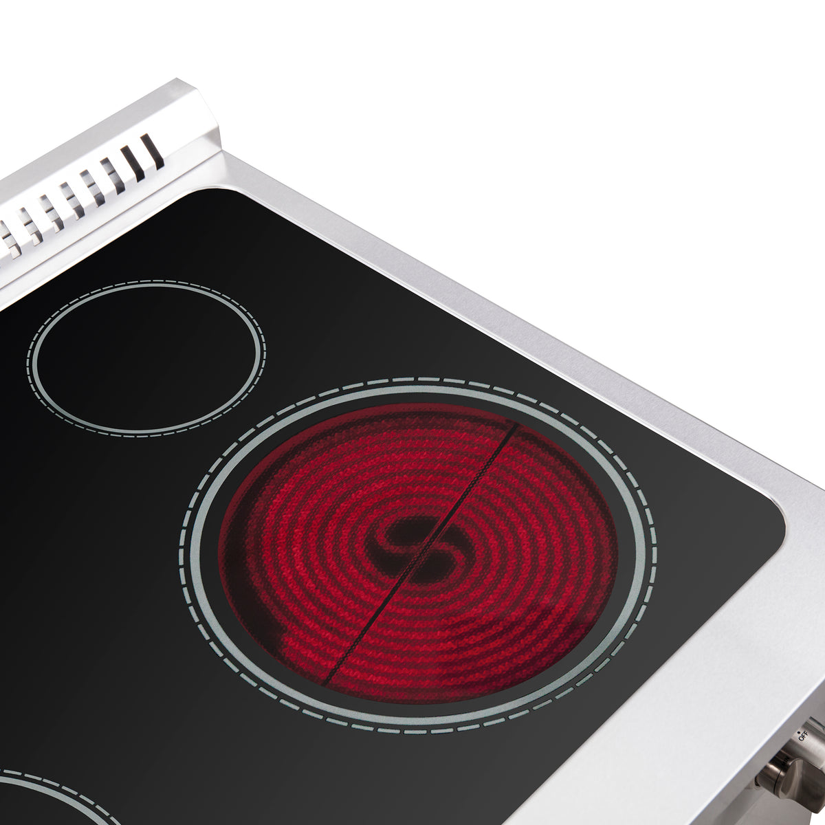 Close-up of a red glowing electric coil burner on black glass cooktop
