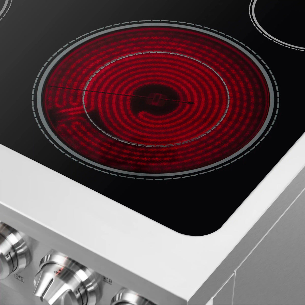 Electric coil cooktop burner with glowing red ring and circular burner grate