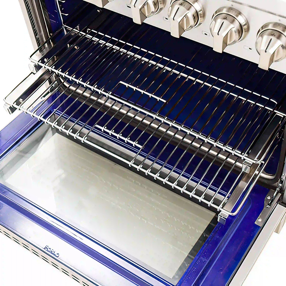 Oven interior with wire racks and heating elements inside a stainless steel range