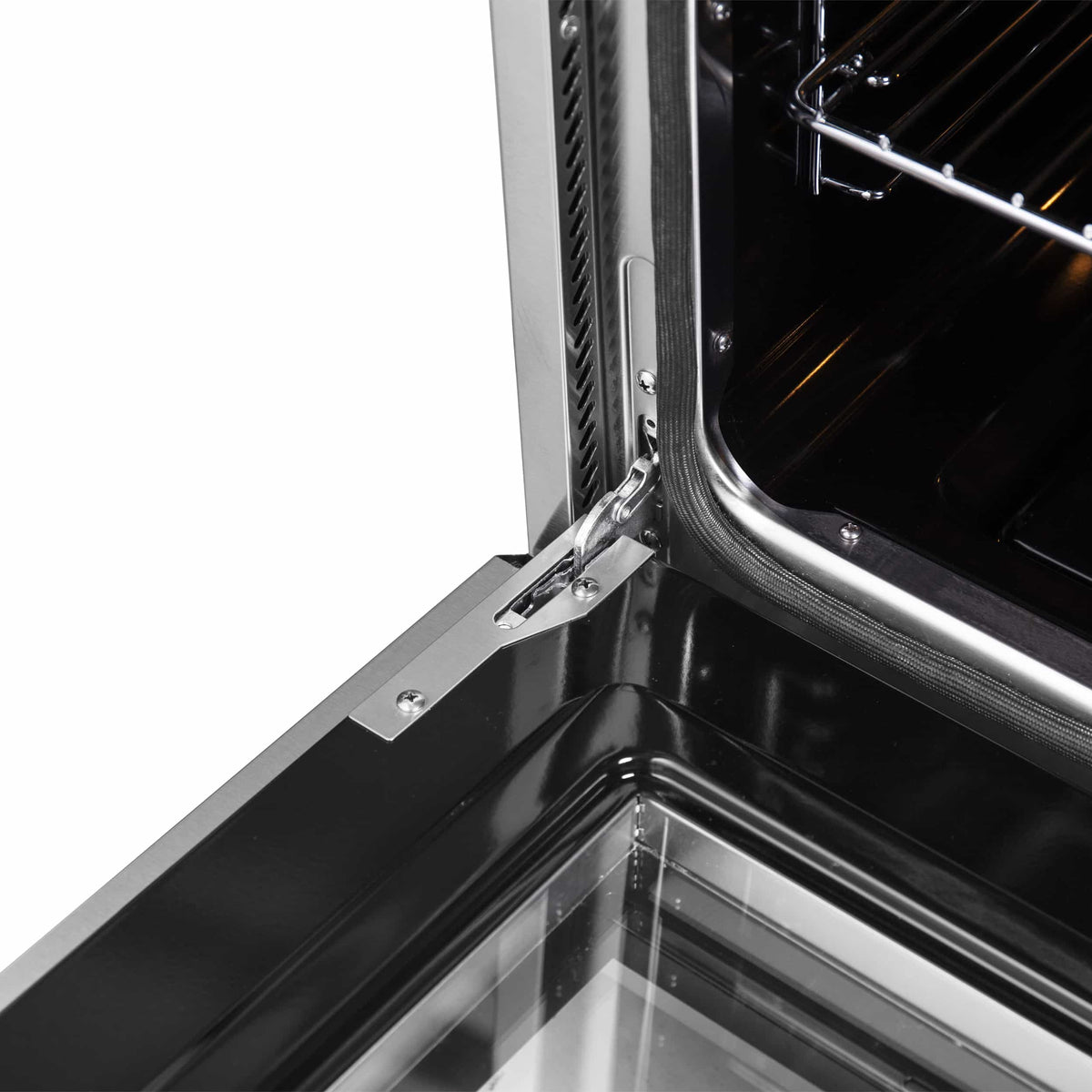 Dual fuel range oven interior corner with open door and stainless steel frame