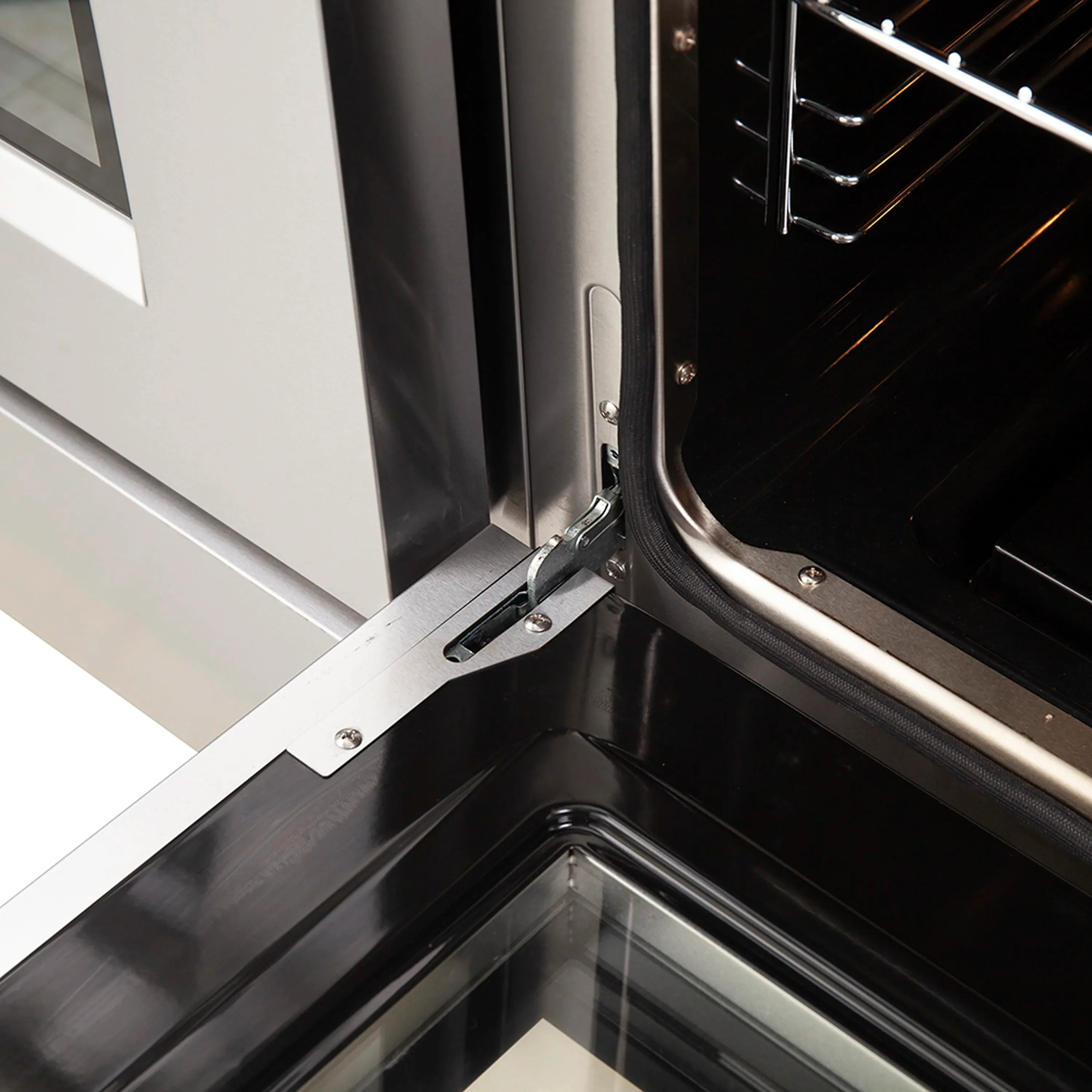 Gas range oven door hinge and inner frame with stainless steel interior
