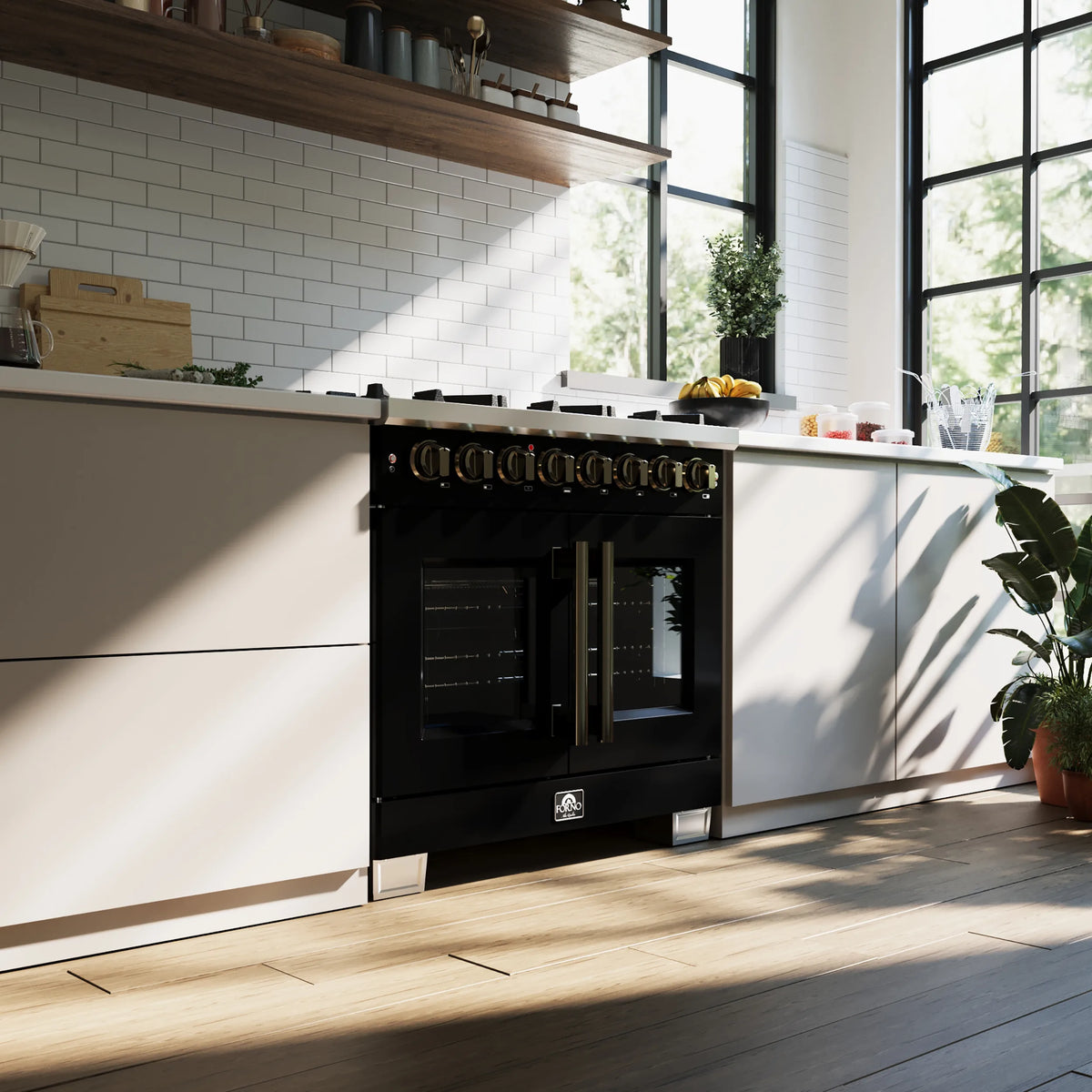 Forno Capriasca 36-Inch 5.36 Cu. Ft. Freestanding French Door Dual Fuel Range with 6 Burners in Black with Antique Brass Trim shown in a styled kitchen