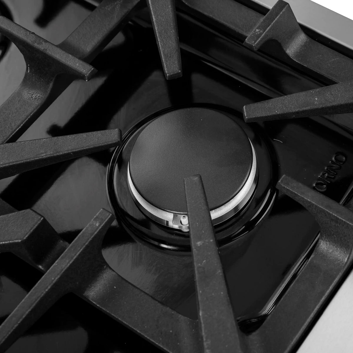 Black cast-iron gas cooktop grate with circular burner cap and burner ring