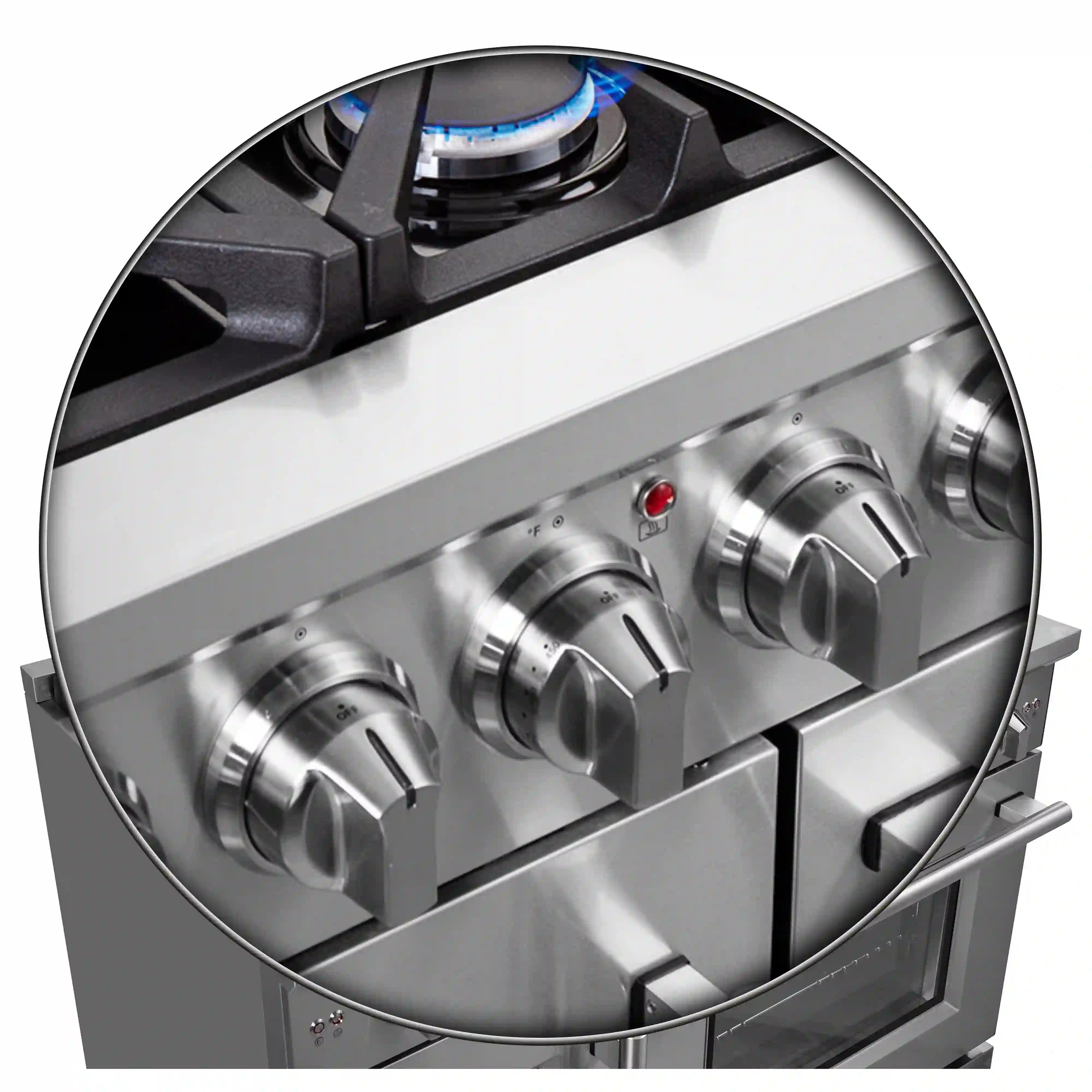 Close-up of stainless steel control knobs with black grates and blue burner flames