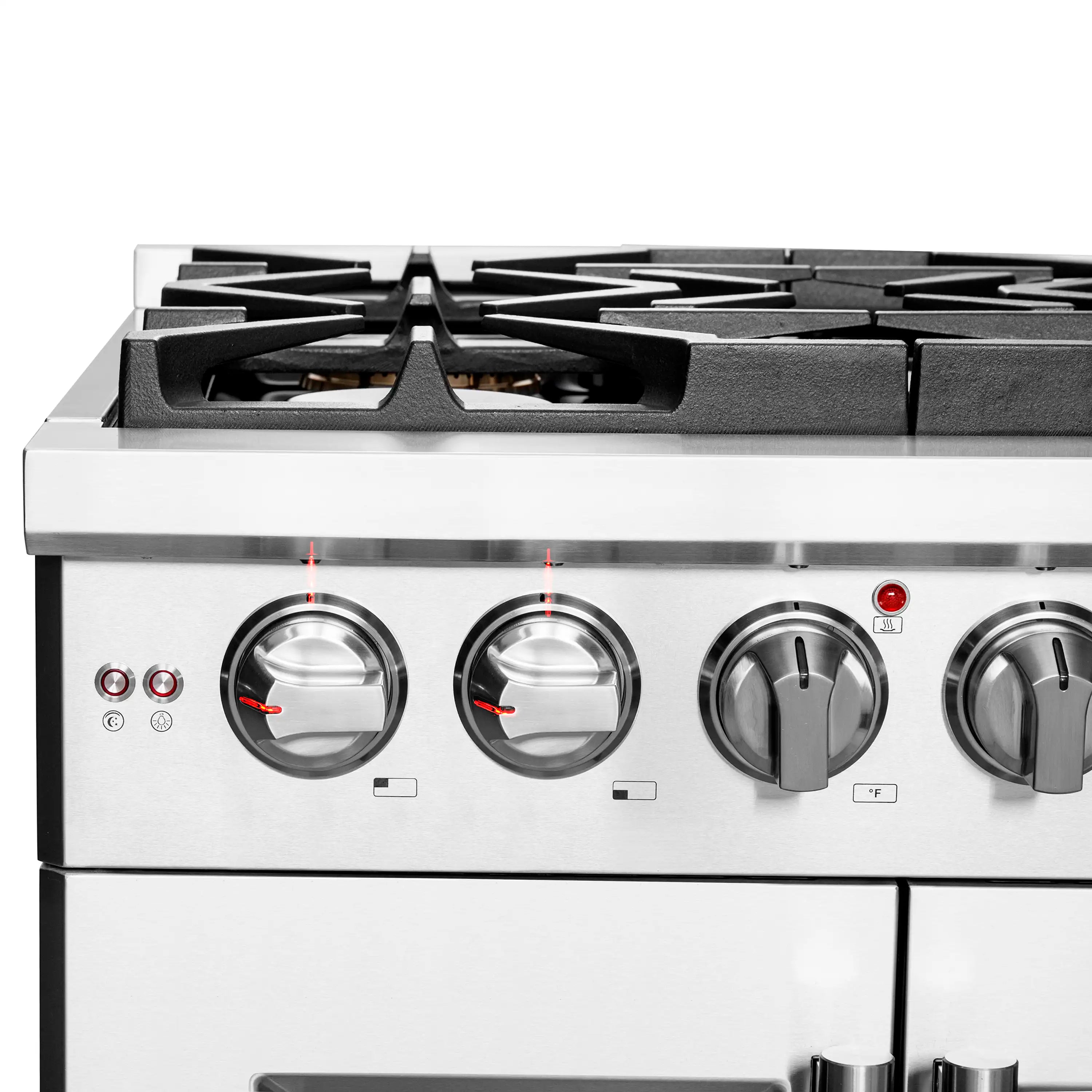 Stainless steel gas range control knobs and burners, front panel close-up