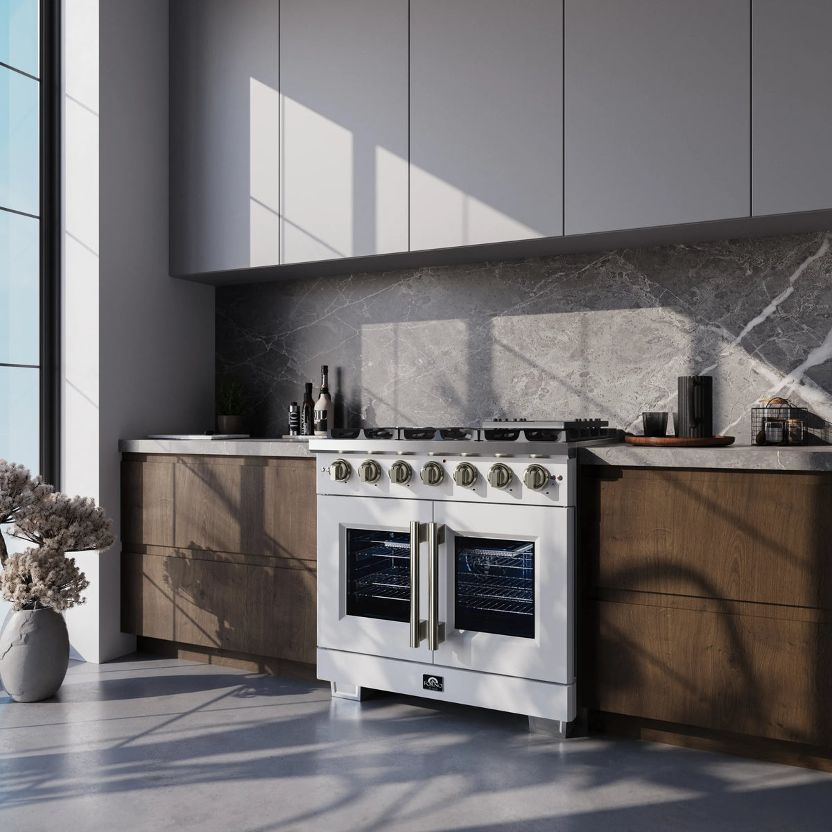 Forno Capriasca 36-Inch Freestanding French Door Gas Range with 6 Burners and 5.36 Cu.Ft. Convection Oven in White with Antique Brass Trim shown in a styled kitchen