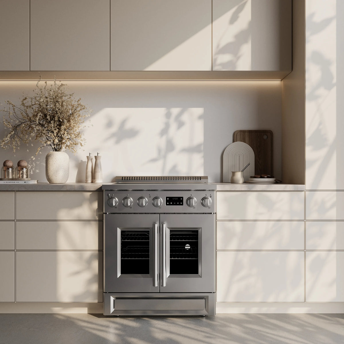 Forno Torino 30-Inch 4.32 Cu. Ft. French Door Induction Range with 4 Elements and True Convection and Air Fry in Stainless Steel shown in a styled kitchen