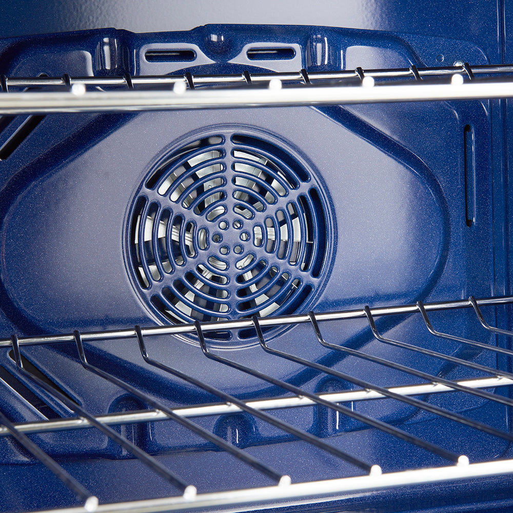 Blue oven interior with circular fan and wire rack