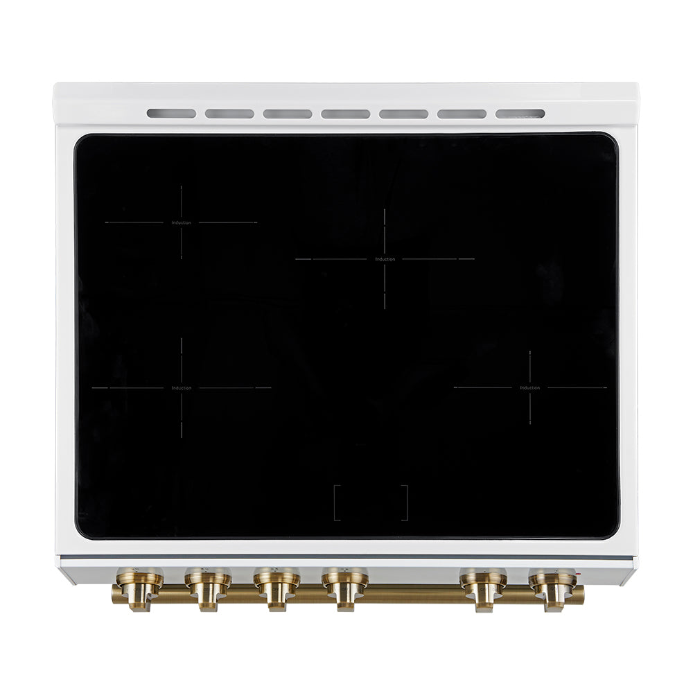 White cooktop glass surface with touch control lines and brass gas knobs