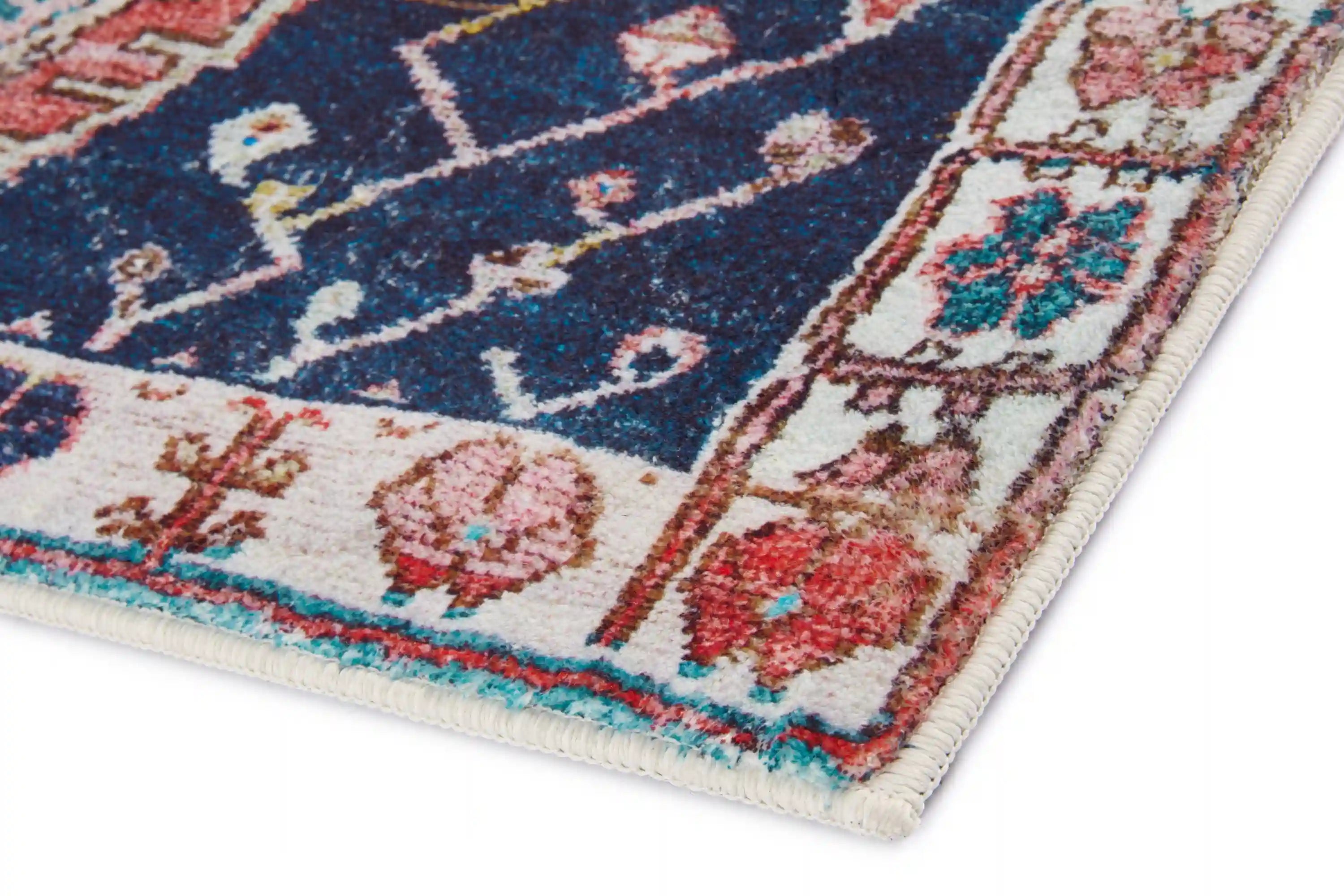 Loloi Fiona contemporary accent rug with navy and rust geometric border, cream base.