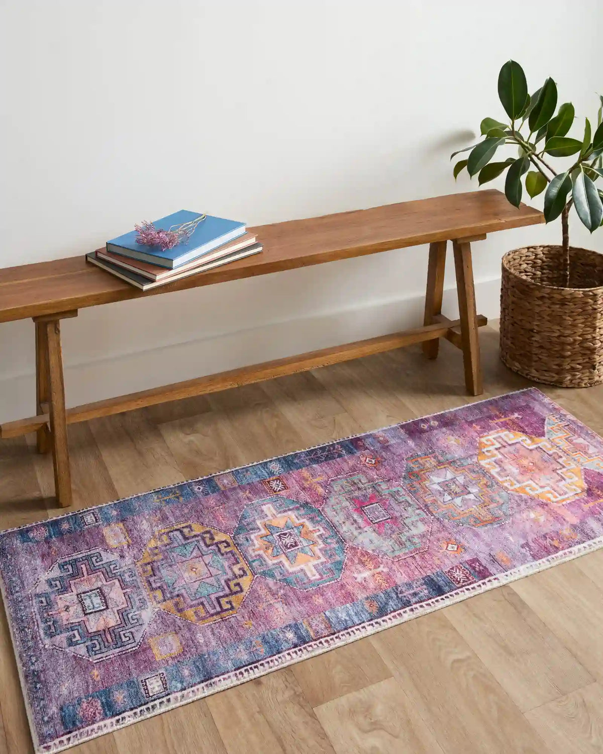 Purple and blue contemporary accent rug with repeating square geometric motifs and border
