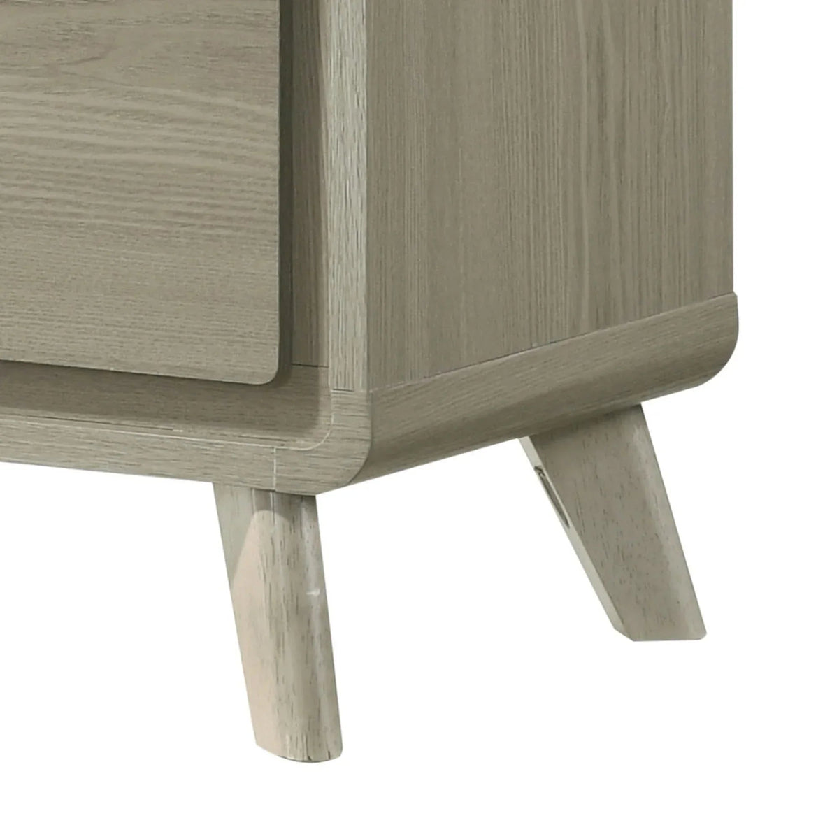 Gray wood nightstand on angled legs with rounded base and drawer overhang