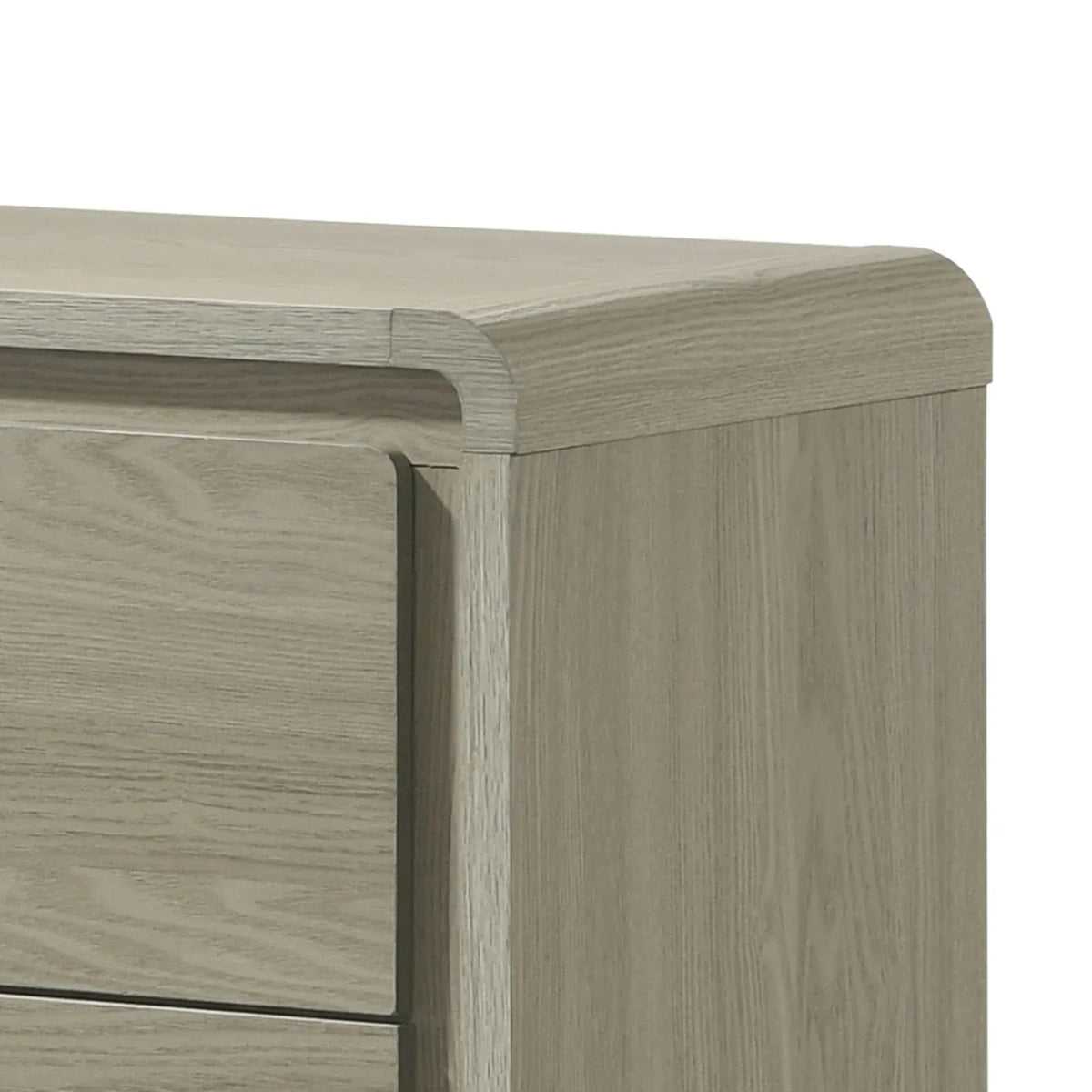 Corner view of gray wood nightstand with rounded edges and clean drawer face
