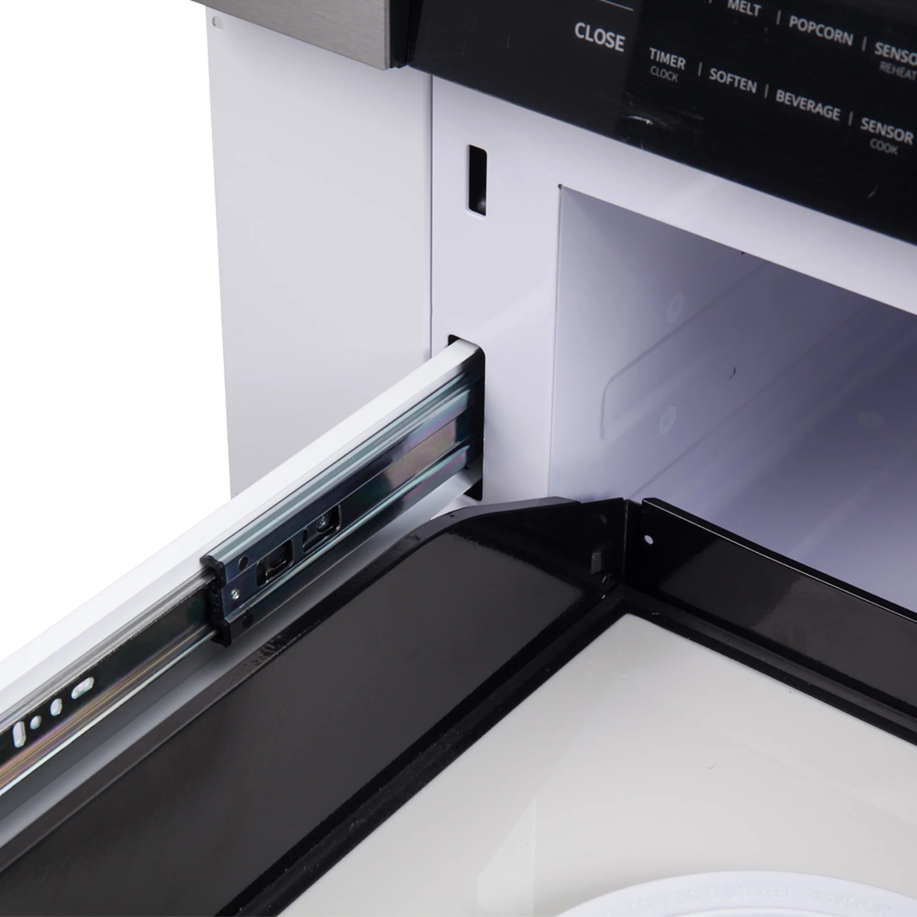 Open microwave drawer interior with dark cavity and side controls