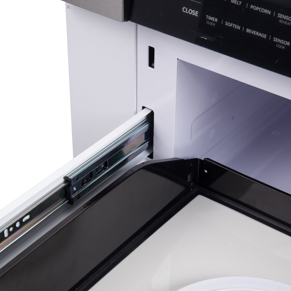 Microwave drawer open showing dark glass interior and side rails
