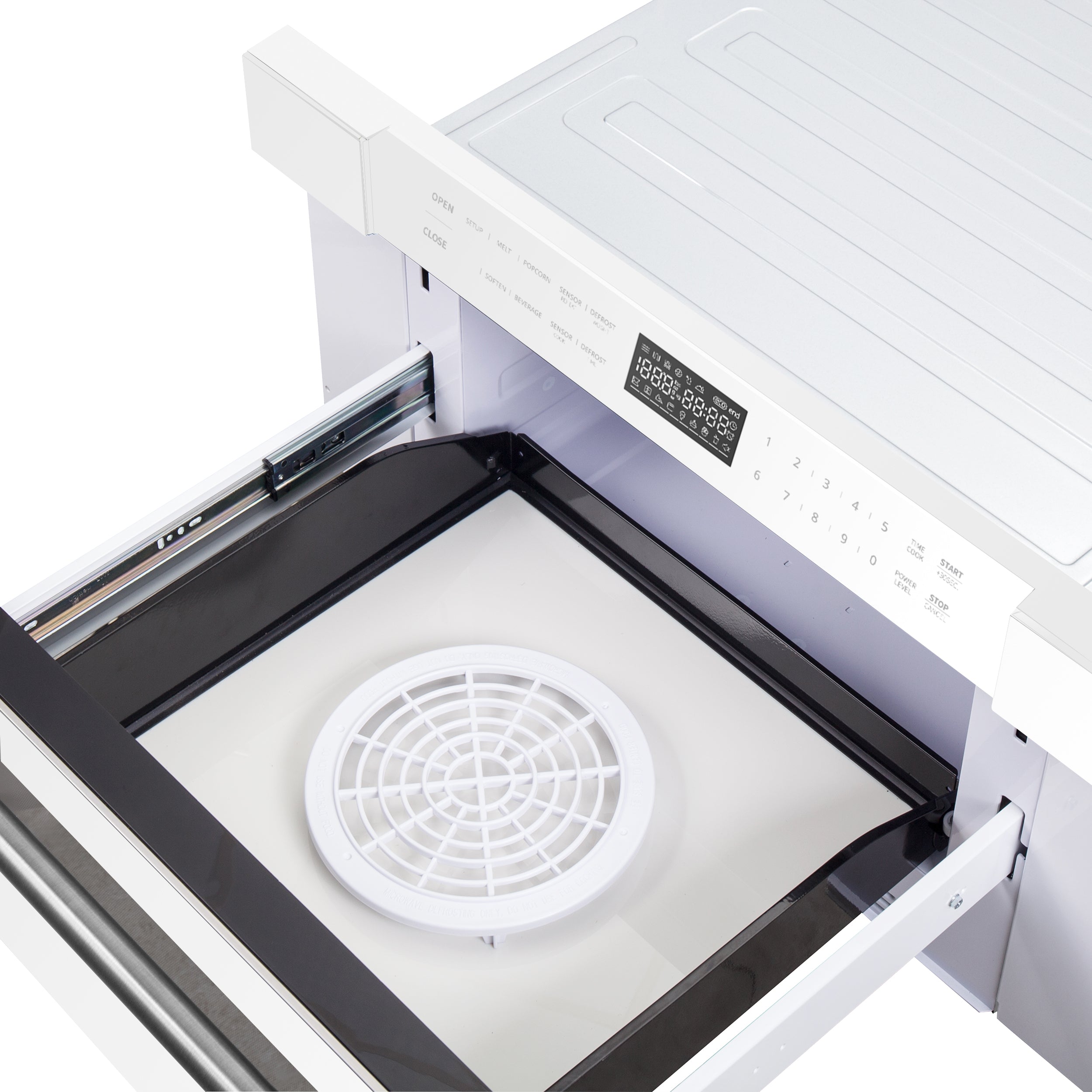 Microwave drawer open showing circular vent fan and white interior base