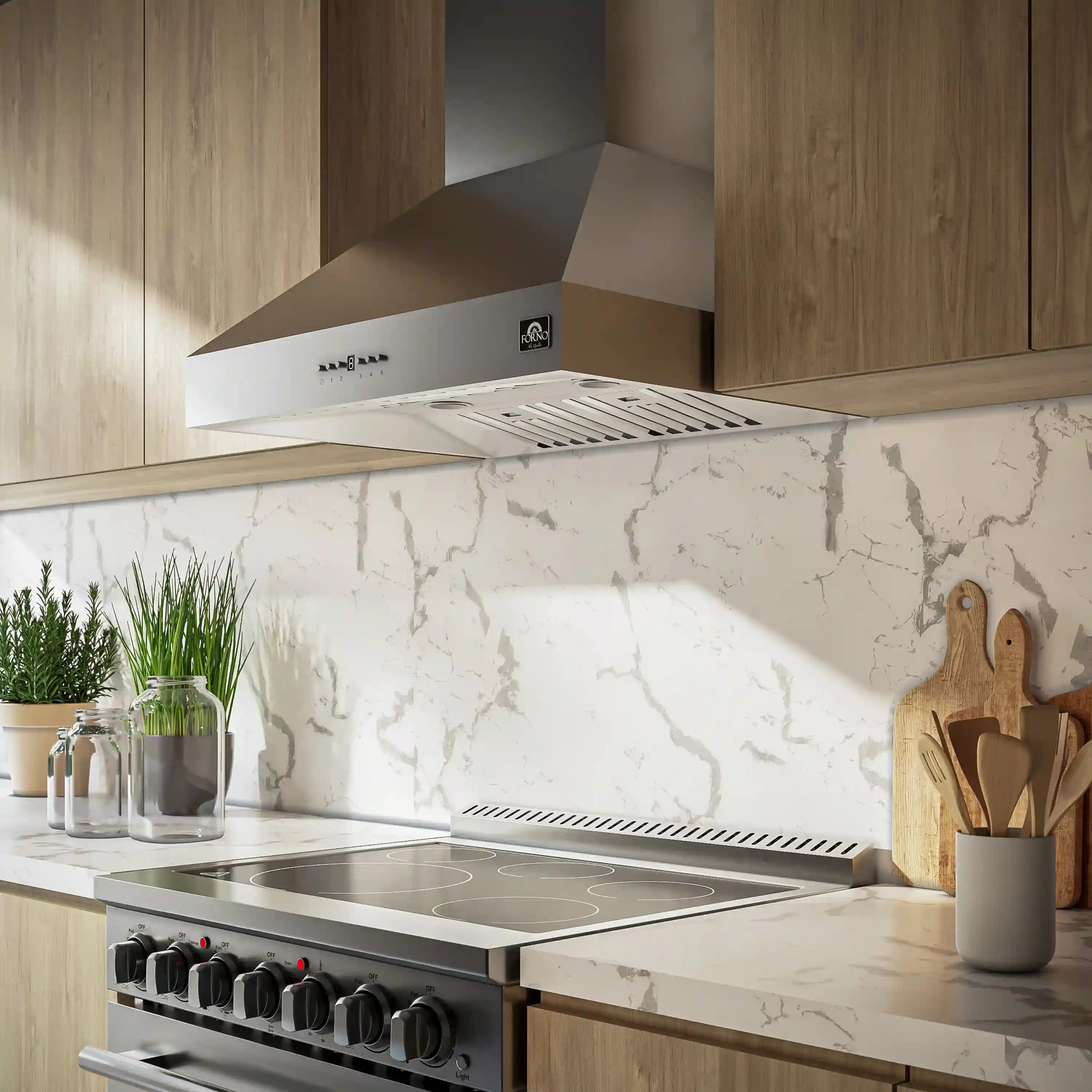 Stainless steel wall mount range hood and dual fuel cooktop with black burner knobs
