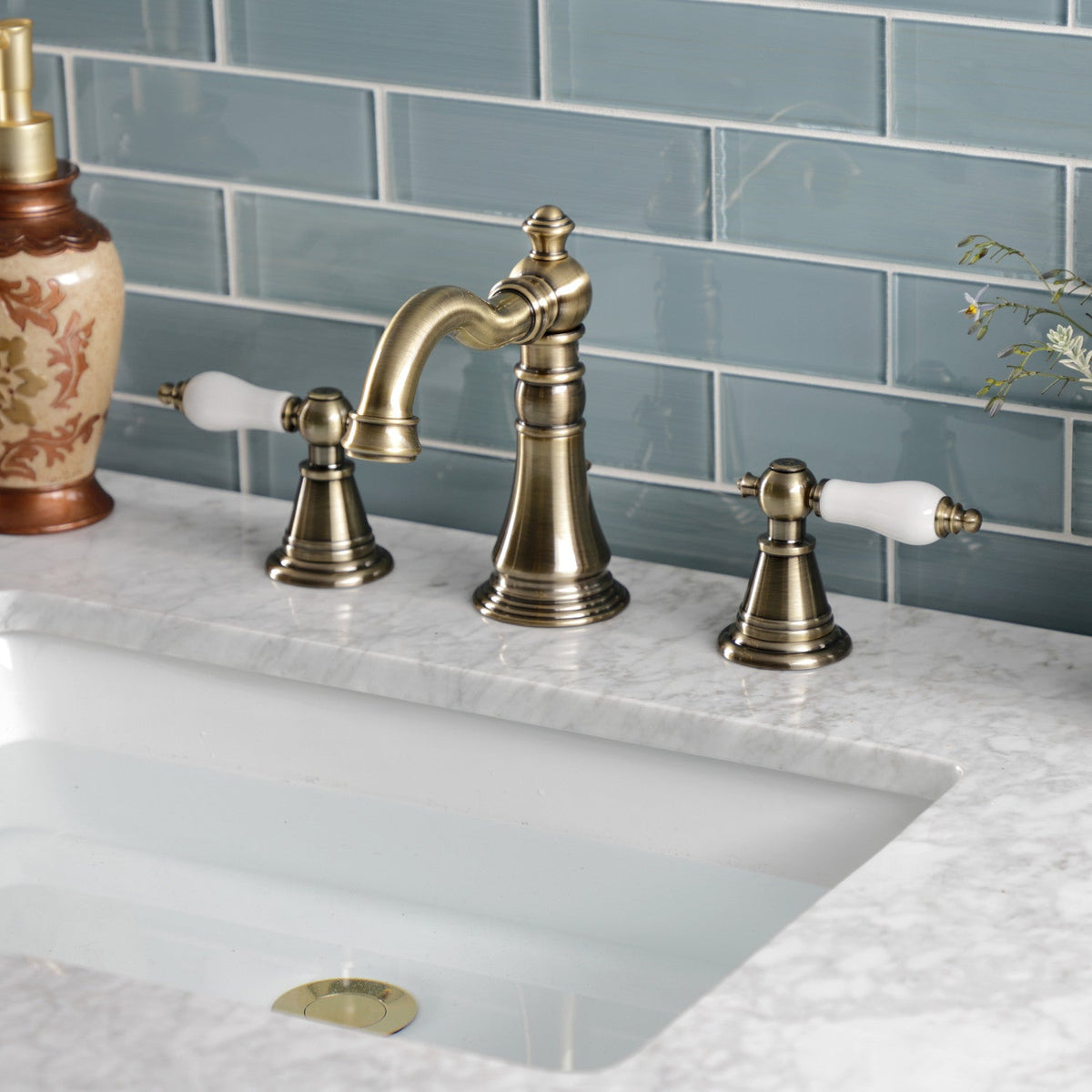 English Classic Widespread Bathroom Faucet with Brass Pop-Up in Antique Brass