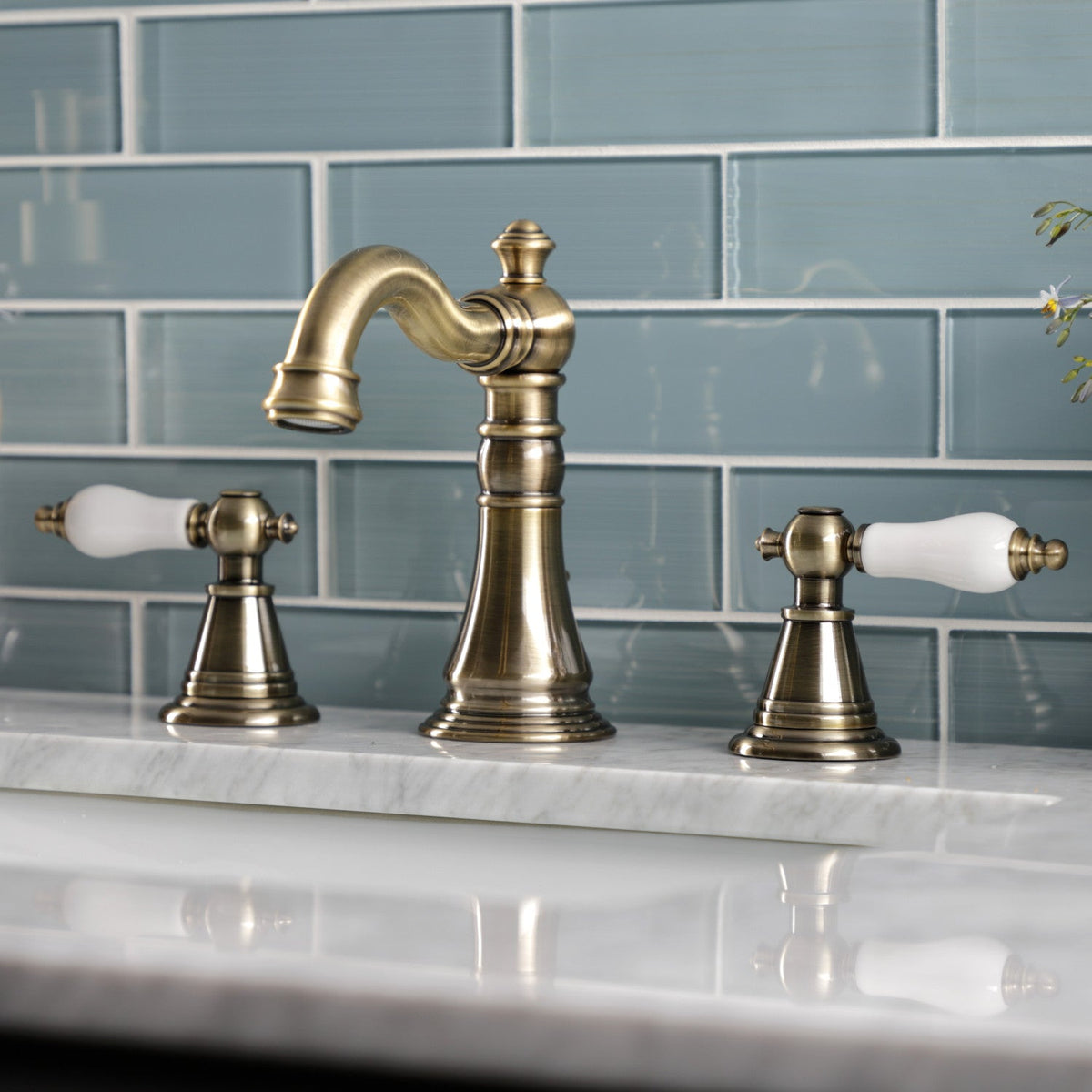 English Classic Widespread Bathroom Faucet with Brass Pop-Up in Antique Brass