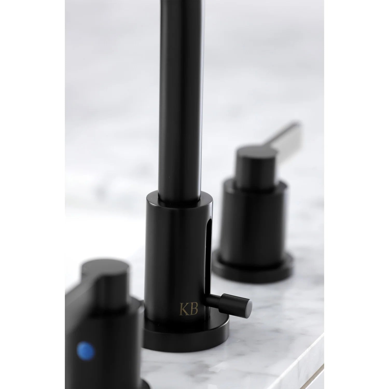 Matte black faucet body with deck bases and arched spout, widespread setup