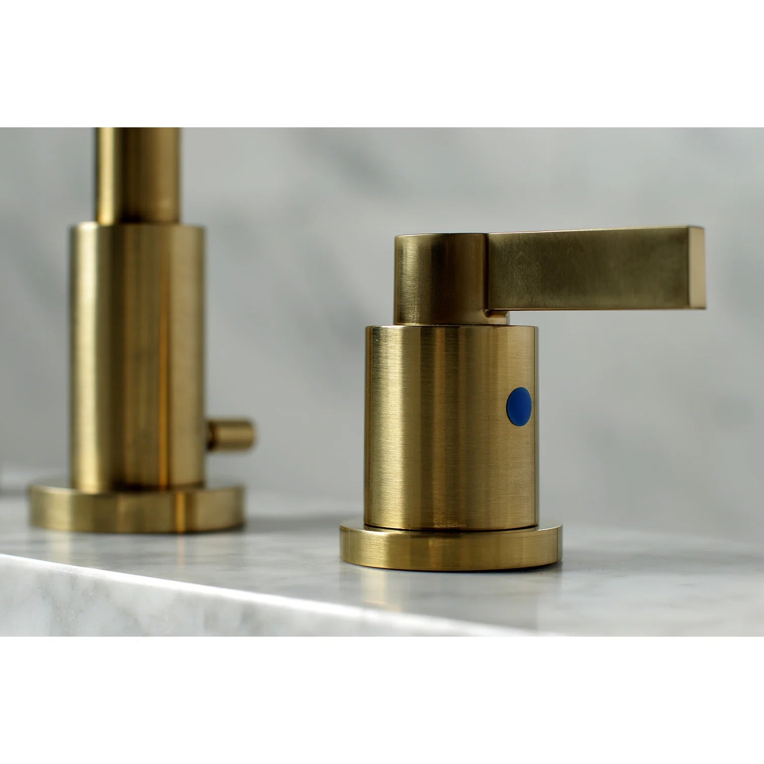 Brushed brass faucet handle assembly with blue accent and flat lever spout base