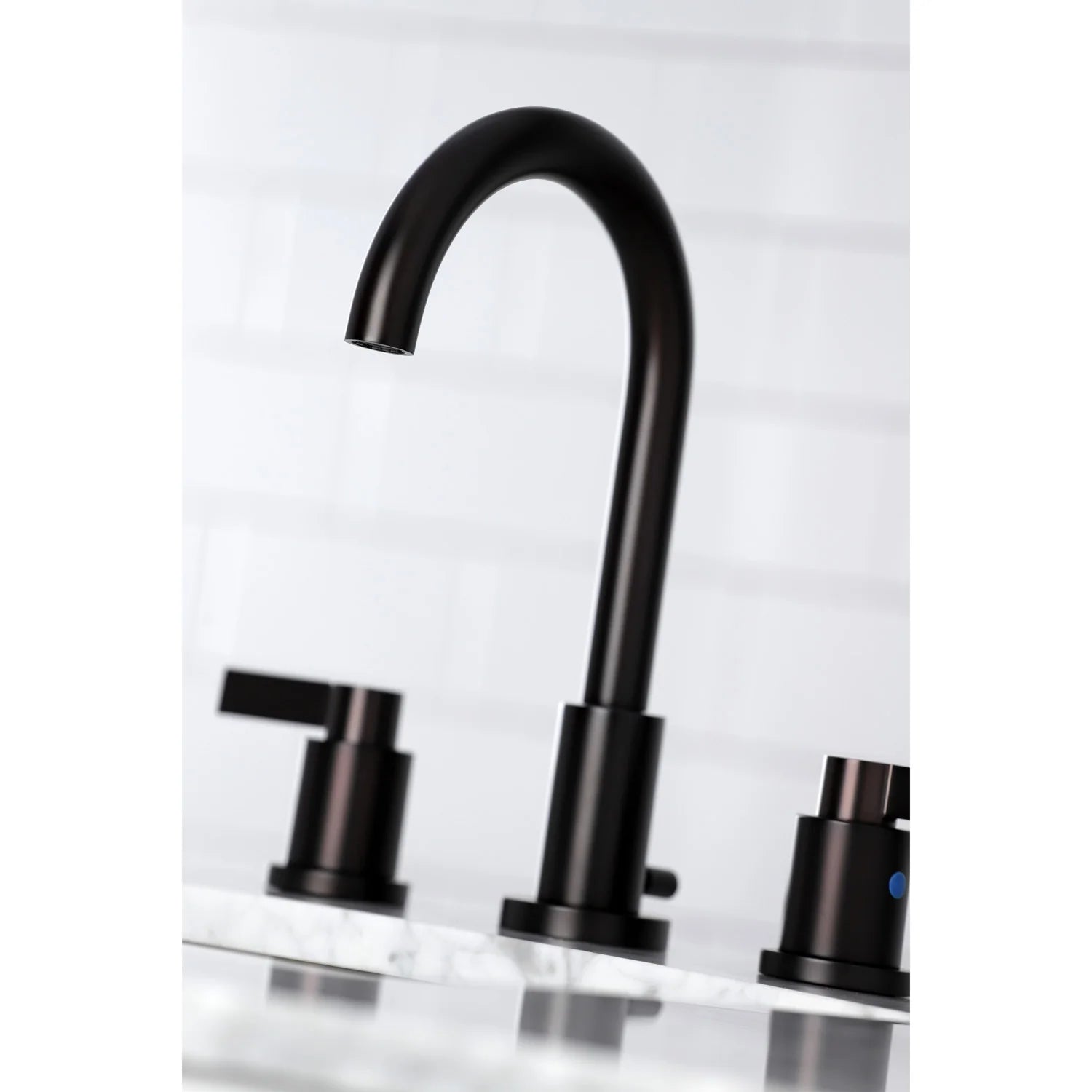 Oil rubbed bronze widespread faucet with arched spout and two slim lever handles